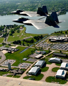 U.S. Air Force and Navy units participated in the Trident Warrior 2013 exercise over the Atlantic Ocean near the Hampton Roads, Va., area, July 8-19. The exercise tested an experimental Joint Tactical Information Distribution System between fourth and fifth-generation fighters, and included F-22 Raptors, F-15 Eagles, F-15 Strike Eagles, F-18 Hornets, T-38 Talons and E-2 Hawkeyes. (U.S. Air Force photo by Staff Sgt. John D. Strong II / Released)