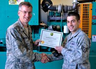 Congratulations to Staff Sgt. Robert Hartley, 5th Civil Engineer Squadron, for earning the 5th Bomb Wing Own It Award for the month of July. Hartley has epitomized the 5th BW commander’s vision of mission ownership.  He distinguished himself by utilizing unconventional means to acquire a training system for the Air Force Power Production school house at Sheppard Air Force Base, Texas.  After hearing that the Air Force Civil Engineer Center was looking for a new training aide for pipeline and advanced troubleshooting schools, Hartley realized Minot AFB had an asset scheduled to be demolished at the old air traffic control tower and quickly coordinated with project managers, contractors, and the AF Civil Engineer Center to setup the removal and shipment of our excess emergency system. Hartley then led a team of five Airmen to remove the generator and automatic transfer switch from the air traffic control tower, repair it, and prepare it for shipment to Sheppard AFB. His innovation in recovering this equipment saved the Air Force $80,000 over new purchase price, and doubled the training assets available for 750 Power Pro pipeline and advanced troubleshooting students annually.