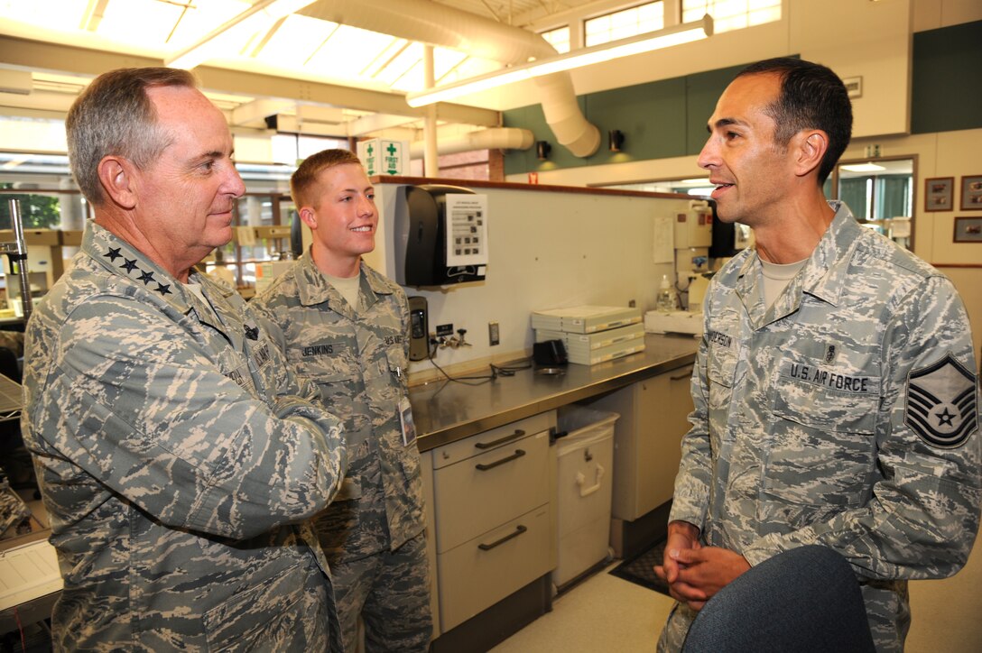 PETERSON AIR FORCE BASE, Colo. – Chief of Staff of the Air Force Gen. Mark A. Welsh III visits with Master Sgt. Dave Anderson, 21st Medical Group dental lab team lead, during a tour of the Area Dental Lab led by Airman 1st Class Qadry Jenkins, 21st MDG dental lab apprentice, June 18 here. The visit to Peterson’s Area Dental Lab followed a base Airman’s call held by Welsh where he thanked the hard-working men and women of the 21st Space Wing and also spoke about the importance of improving communication within the Air Force while also taking better care of our Airmen. (U.S. Air Force photo/Staff Sgt. J. Aaron Breeden)