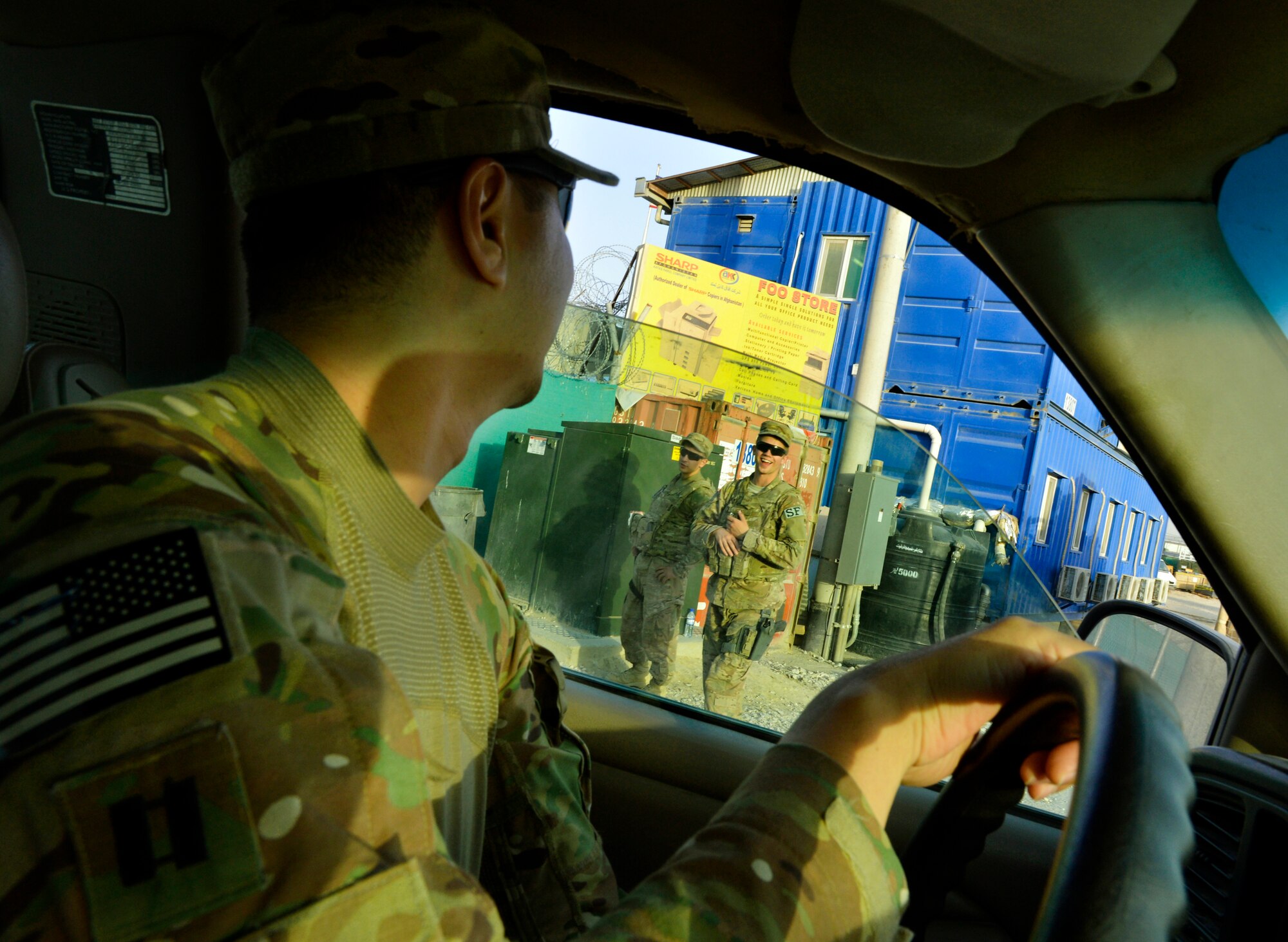 Chaplain (Capt.) Myung Cho greets airmen assigned to the 455th Expeditionary Security Forces Group as they walk to work on Bagram Air Field, Afghanistan, July 17. No matter the time or the day, Cho visits the Airmen as much as he can to raise their morale. and see how they are doing. ( U.S. Air Force photo/ Staff Sgt. Stephenie Wade)