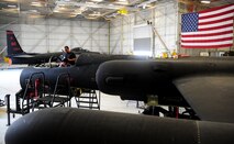 C.J. Gaecke (left) and Bryan Duran, Lockheed Martin structure mechanics, install the last piece of a U-2 aircraft modification on June 25, 2013 at Beale Air Force Base, Calif. The aircraft was one of 22 U-2 airframes to undergo Cockpit Altitude Reduction Effort modifications to enhance pilot safety. The upgrades virtually eliminate the risk of decompression sickness and hypoxia. (U.S. Air Force photo by Airman 1st Class Bobby Cummings/Released)