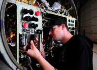 Brenden Osborn, Lockheed Martin structure mechanic, inspects Cockpit Altitude Reduction Effort modifications to a U-2 airframe on June 25, 2013 at Beale Air Force Base, Calif. Twenty-two U-2 aircraft received the modifications from September 2012 to June 2013. The upgrades virtually eliminate the risk of decompression sickness and hypoxia.   (U.S. Air Force photo by Airman 1st Class Bobby Cummings/Released)