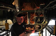 C.J. Gaecke, a Lockheed Martin structure mechanic, explains Cockpit Altitude Reduction Effort modifications made to a U-2 airframe on June 25, 2013 at Beale Air Force Base, Calif. This aircraft was the last of 22 to receive such modifications at Beale. The upgrades virtually eliminate the risk of decompression sickness and hypoxia. (U.S. Air Force photo by Airman 1st Class Bobby Cummings/Released)