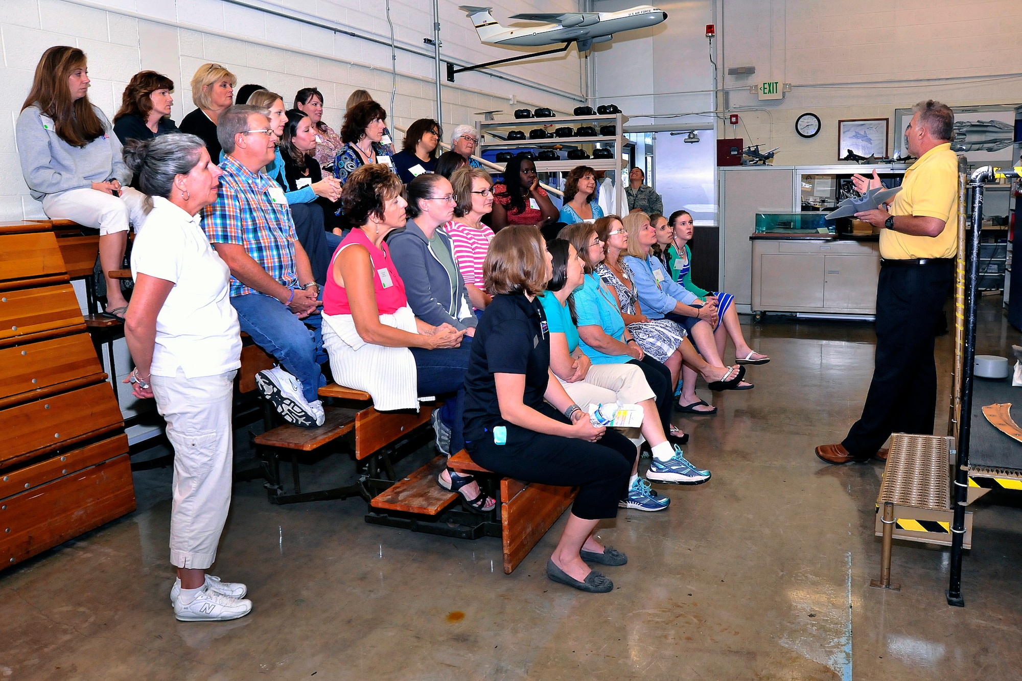 Mr. Chris Seaver, Dept. of Aeronautics deputy director for laboratory operations, shows the STEM teachers a model of the 5th Generation Aerial Target Drone during a visit to the Aero Lab. (U.S. Air Force Photo/Sam Lee)
