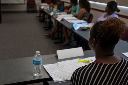 Staff Sgt. Lakin Trahan, 628th Air Base Wing protocol specialist, attends the Sexual Assault Prevention and Response class July 24, 2013, at Joint Base Charleston – Air Base, S.C. SARCs and Victim Advocates are available at Department of Defense installations to assist victims of sexual assault. The JB Charleston SARC can be reached at 843-963-7272 and DOD has a 24-hour hotline at 1-800-342-9647. (U.S. Air Force photo/Senior Airman Ashlee Galloway)