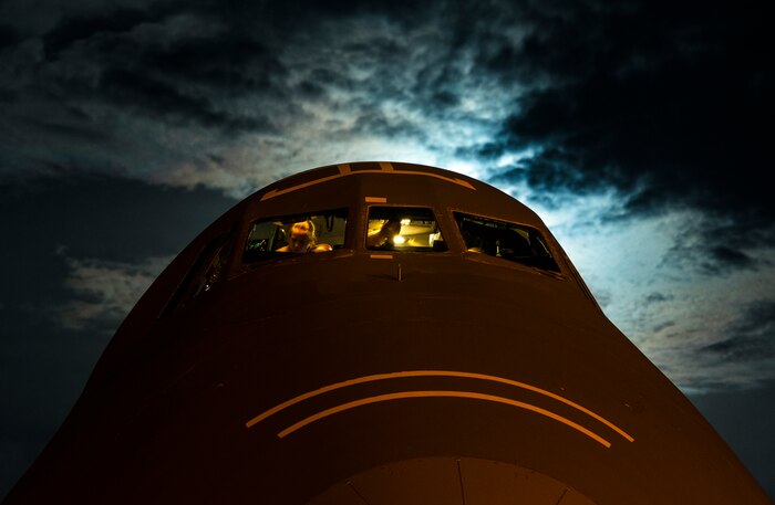 West Virginia Air National Guard aircrew members with the 167th Airlift Wing out of Martinsburg, W. Va., perform post flight checks inside the cockpit of a C-5 Galaxy July 22, 2013, at Joint Base Charleston – Air Base, S.C. Airmen from the 167th AW loaded cargo onto the C-5 to be used to support Operation Enduring Freedom. The C-5 is one of the largest aircraft in the world and the largest airlifter in the Air Force inventory. (U.S. Air Force photo/ Senior Airman Dennis Sloan)