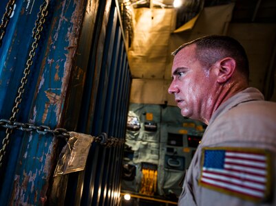 Master Sgt. David Martens, West Virginia Air National Guard member, 167th Maintenance Squadron C-5 Galaxy load master from Martinsburg, W. Va., rests in between cargo loads July 22, 2013, at Joint Base Charleston – Air Base, S.C. The cargo is being used to assist operation Enduring Freedom. The C-5 is one of the largest aircraft in the world and the largest airlifter in the Air Force inventory. (U.S. Air Force photo/ Senior Airman Dennis Sloan)