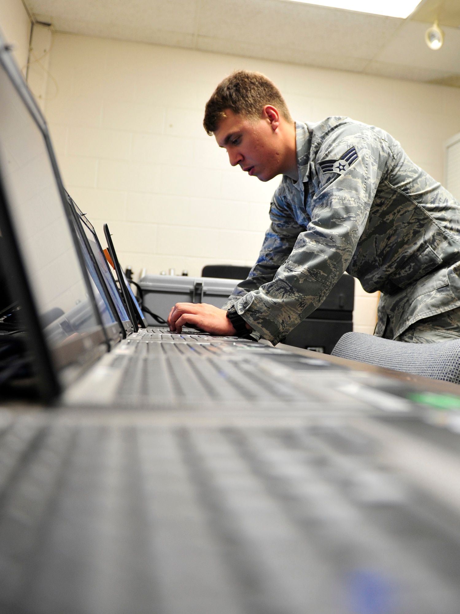 Minot Air Force Base’s Client System Technicians assigned to the 5th Communications Squadron provide computer support to more than 6,000 users across the base and are responsible for all computer maintenance, hand-held radio maintenance, and public announcement setup requests. If there is an issue with any computer on base, it is handled primarily by the 5th CS CST team. The unit’s motto is “FROM THE DESK TO THE WALL, WE DO IT ALL!” 