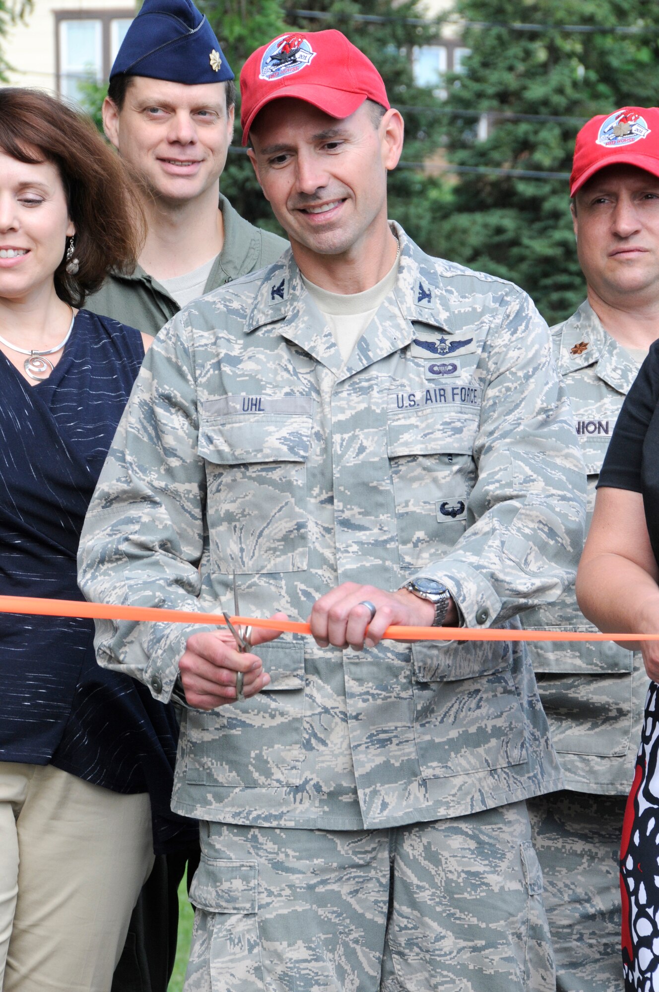 Col. Blake Uhl, 201st RED HORSE commander, cuts the ribbon June 19, opening a new portion of the Rails to Trails in Lebanon, Pa. Airmen from the 201st RED HORSE helped build a 3/4-mile section of the recreational trail at 9th and Chestnut streets. (U.S. Air National Guard photo by Tech. Sgt. Culeen Shaffer/Released)
