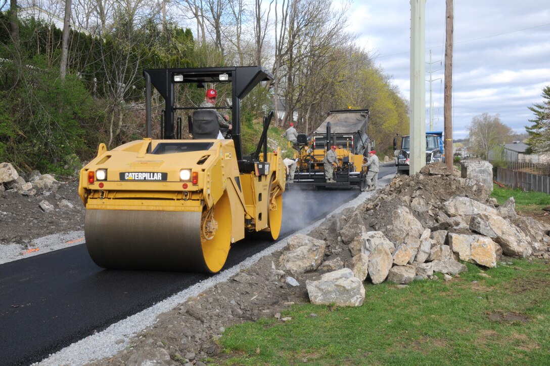 Members of the 201st RED HORSE pave a portion of the Lebanon Valley Rail Trail near 9th and Chestnut streets. (U.S. Air National Guard photo by Senior Master Sgt. David Hawkins/Released)