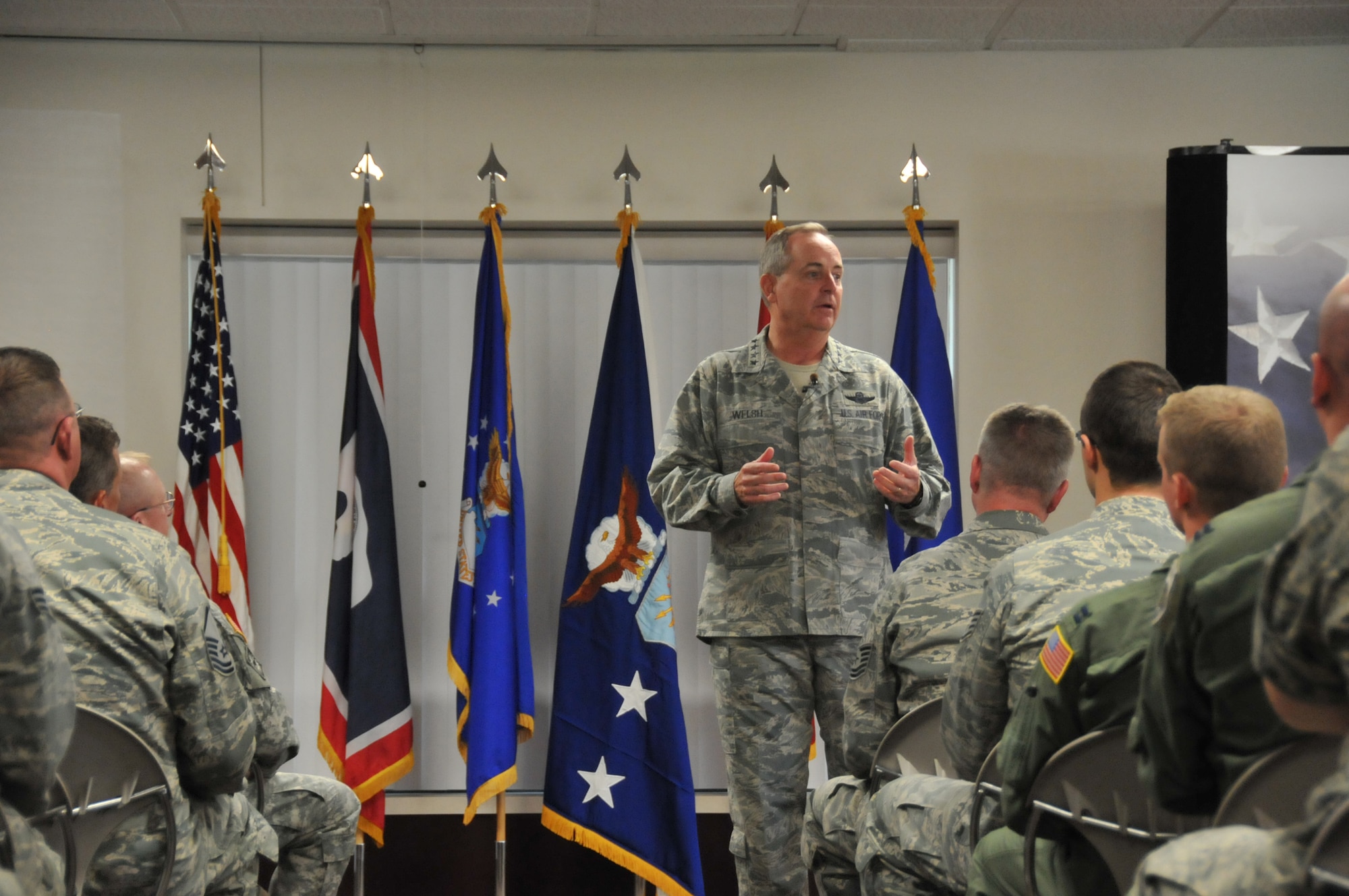 Air Force Chief of Staff Gen. Mark A. Welsh III addresses Airmen of the 153rd Airlift Wing, Wyoming Air National Guard, during an Airman's call July 19, 2013 in Cheyenne, Wyo. Welsh thanked the 153rd AW, discussed Air Force priorities and answered questions from the audience. (U.S. Air National Guard photo by Senior Airman Nichole Grady)