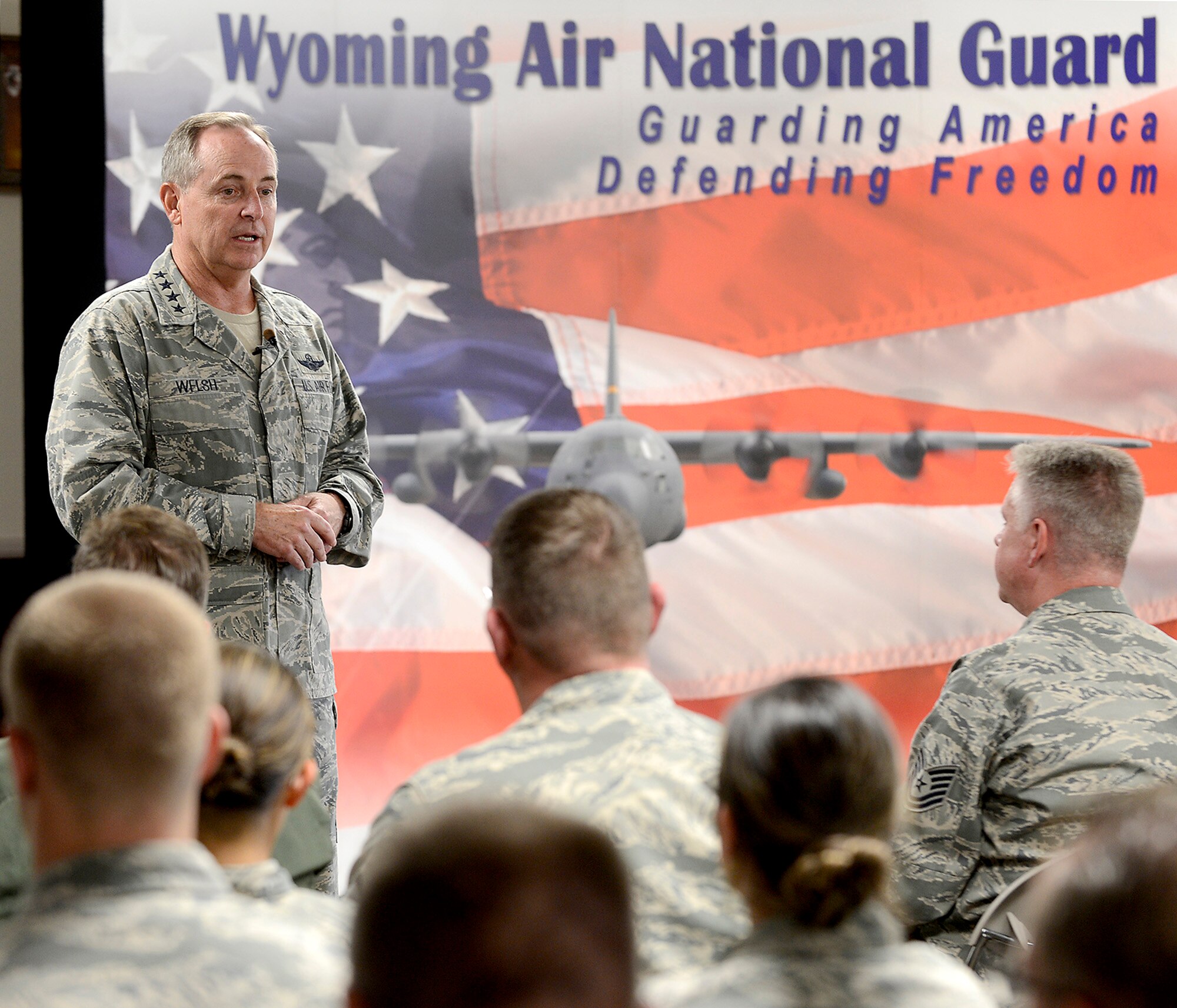 Air Force Chief of Staff Gen. Mark A. Welsh III speaks to members of the Wyoming Air National Guard after arriving at Cheyenne Regional Airport, Wyo., July 19, 2013. Welsh applauded the 153rd Airlift Wing's role in hosting the Air National Guard's first active duty associate unit, the 30th Airlift Squadron, as well as their contributions to ongoing firefighting efforts.  He spoke about the important role each component plays in enabling airpower for the nation, while also addressing key issues affecting the service -- like sequestration, furlough and sexual assault prevention response efforts. (U.S. Air Force photo by Scott M. Ash)