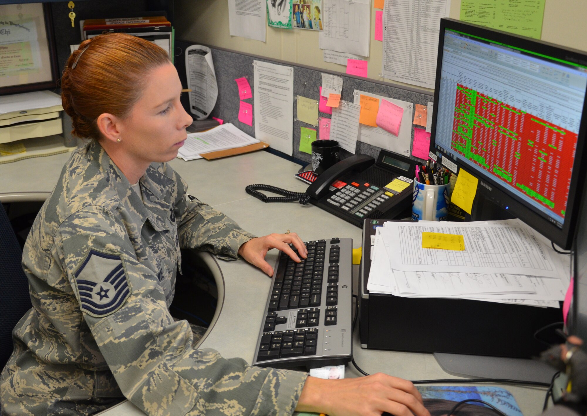 Master Sgt. Heidi White, the unit training manager for the 920th Maintenance Group, tracks pre-deployment training for group Airmen at Patrick Air Force Base, Fla., July 24, 2013, using a tracking tool she designed. Her tracking tool has led to streamlined processes and increased efficiencies for deploying Airmen and their supervisors throughout the wing. (U.S. Air Force photo/Tech. Sgt. Anna-Marie Wyant)