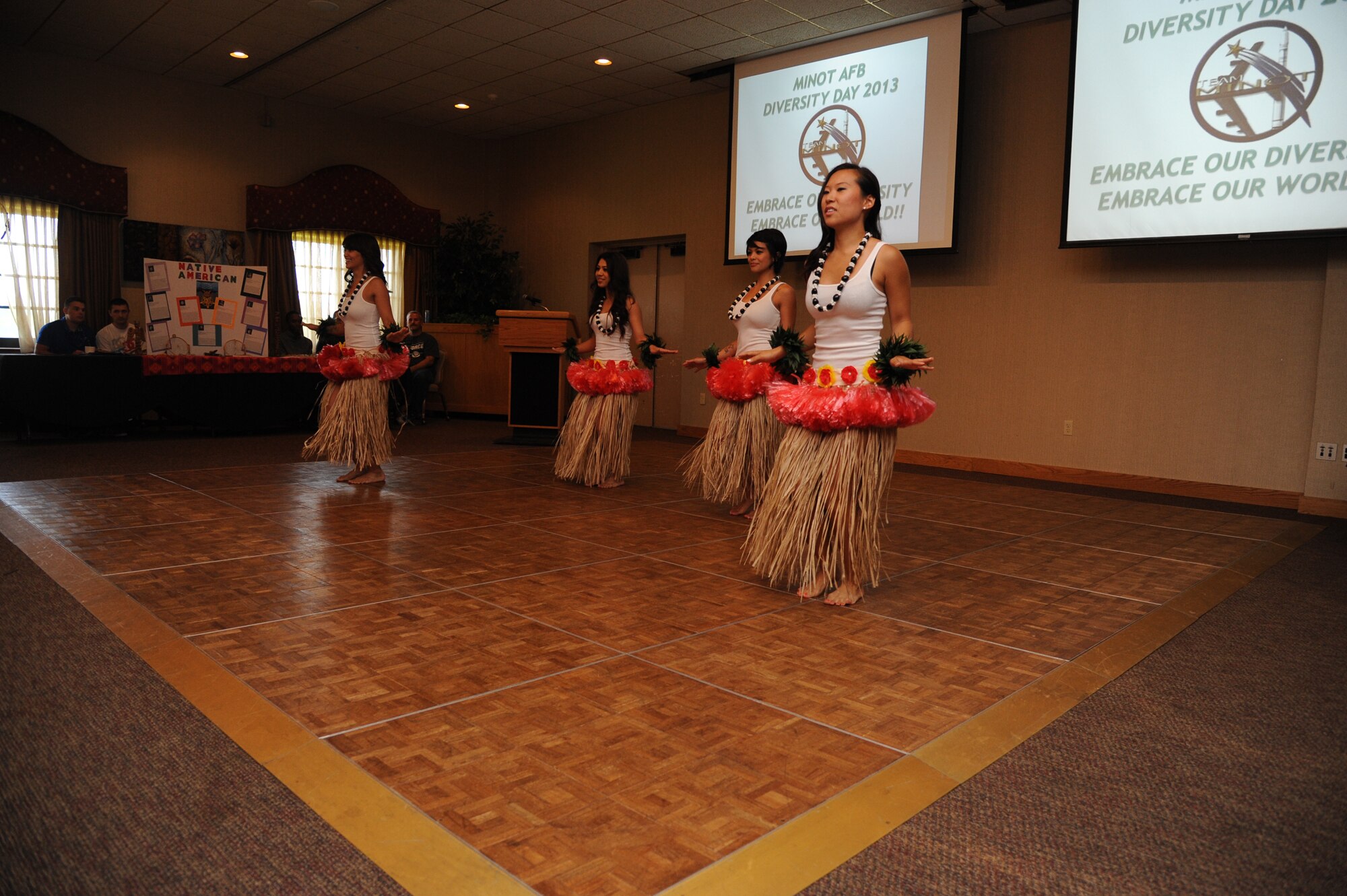 Members of Team Minot came together to celebrate Cultural Diversity Day at Minot Air Force Base’s Jimmy Doolittle Center, July 19, 2013. Cultural Diversity Day celebrates and heightens awareness of the diverse cultures within the community. The cultural celebration also included music, literature, poetry, face painting, games, educational booths and food for children and adults.(U.S. Air Force photo/ Airman 1st Class Andrew Crawford)