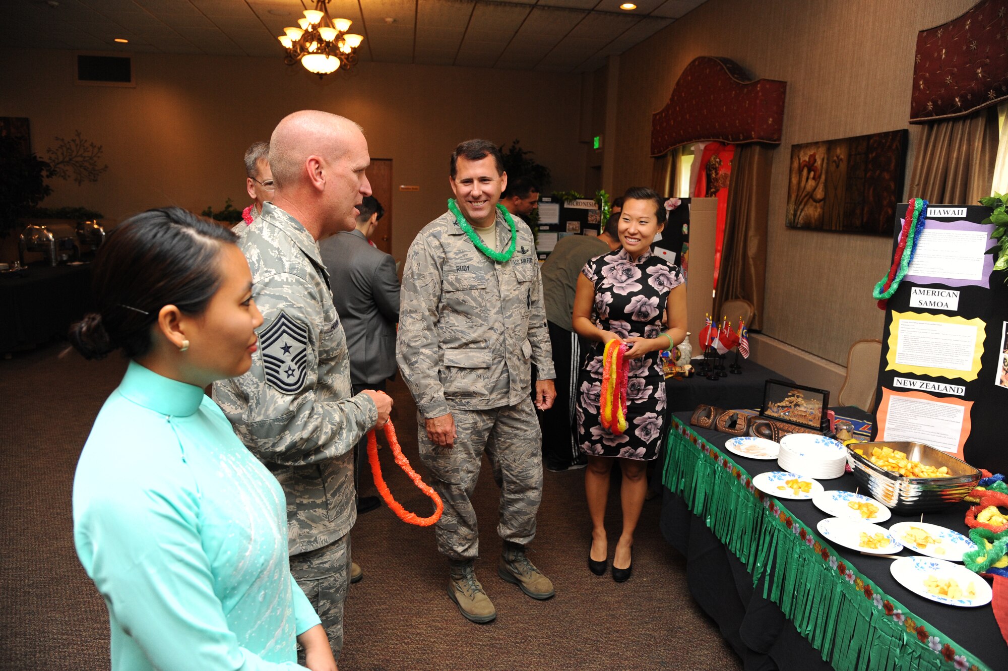Members of Team Minot came together to celebrate Cultural Diversity Day at Minot Air Force Base’s Jimmy Doolittle Center, July 19, 2013. Cultural Diversity Day celebrates and heightens awareness of the diverse cultures within the community. The cultural celebration also included music, literature, poetry, face painting, games, educational booths and food for children and adults. 