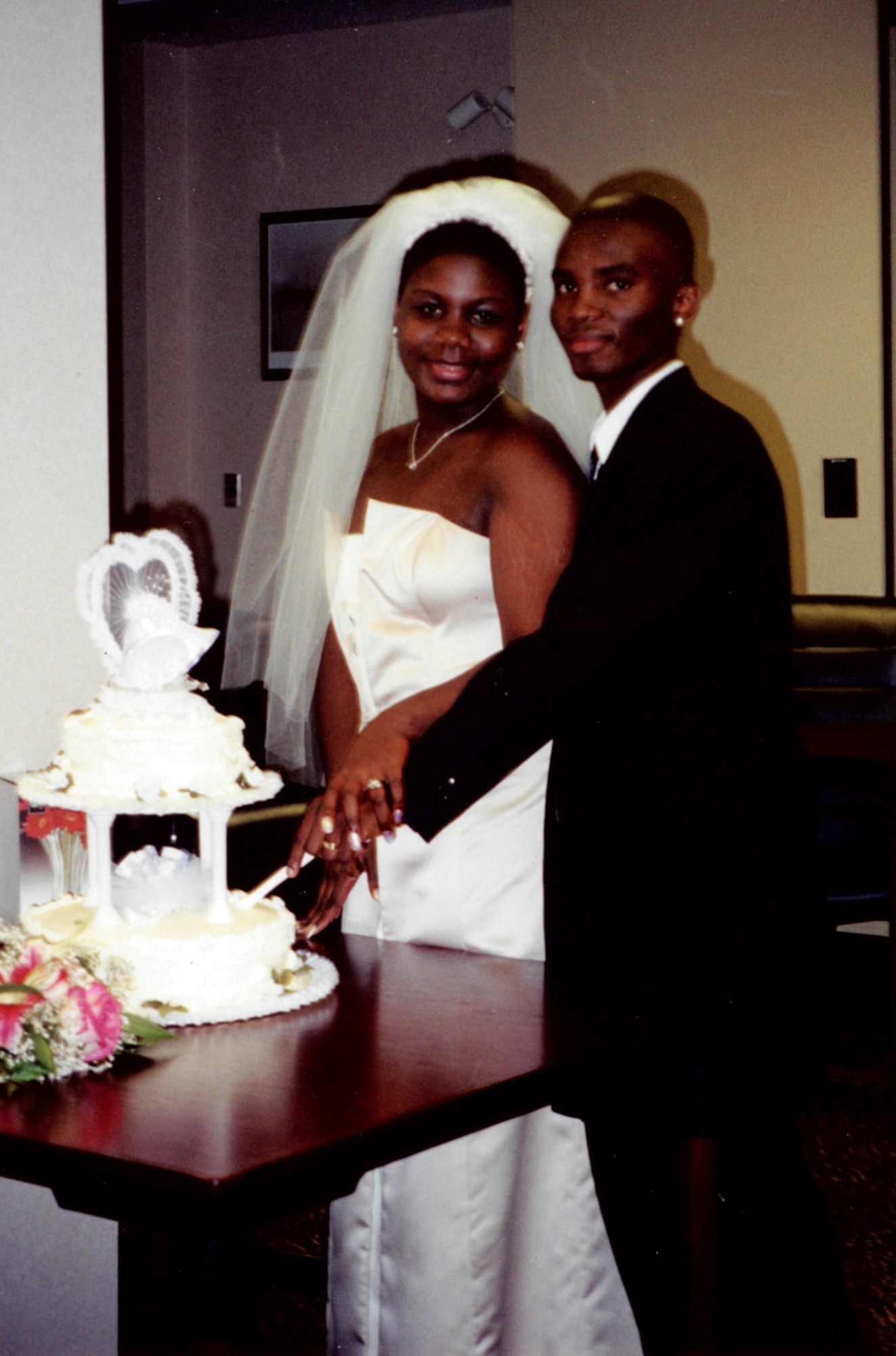 Staff Sgt. Agyen-Frempong and his wife Stephanie met April, 1997 when he was a junior and she was a sophomore in high school, remaining high school sweethearts to this day after marrying in November, 2000. Agyen-Frempong is now an instructor with the 335th Training Squadron. (U.S. Air Force photo by Tara Spacy)