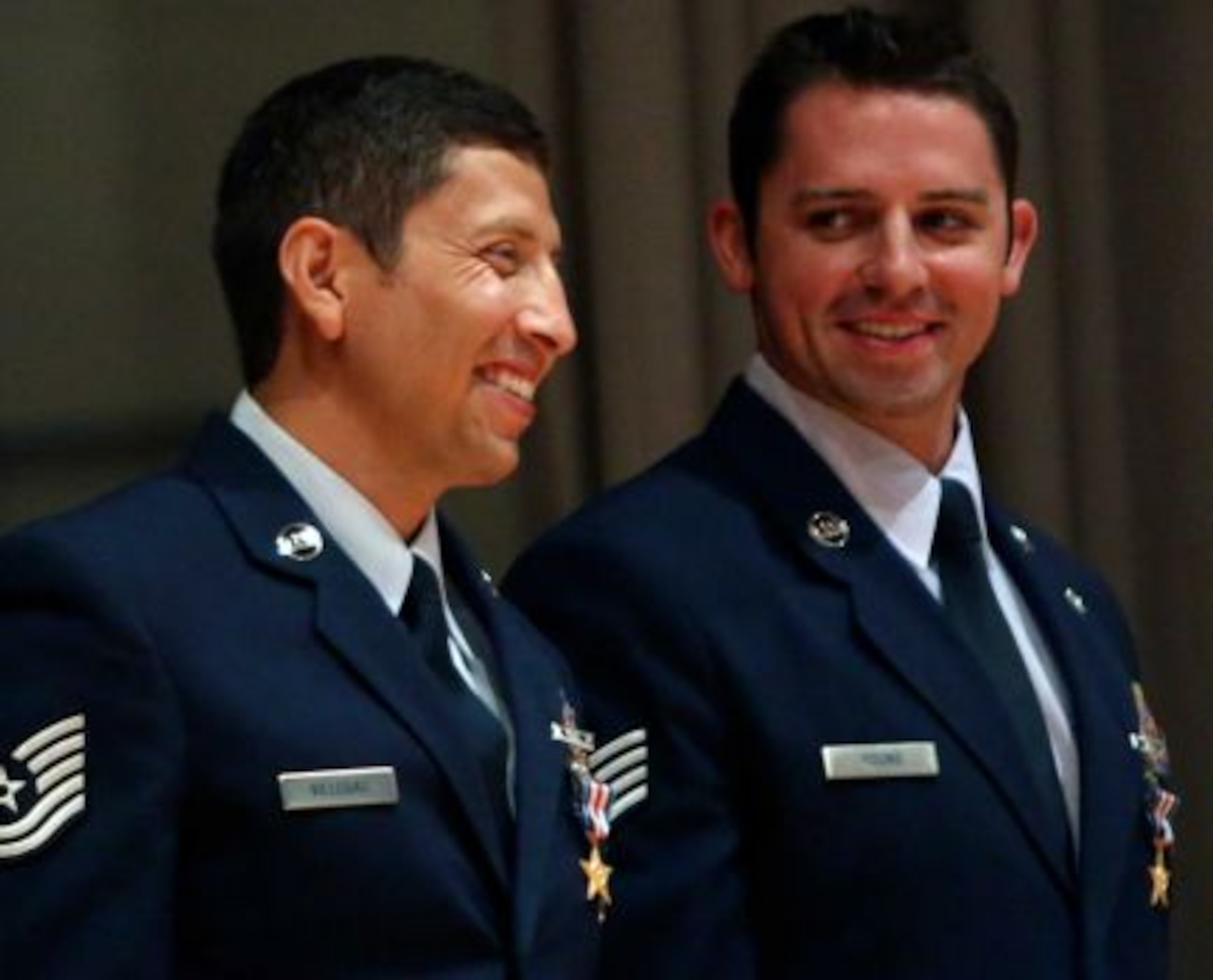 Staff Sgt. Dale C. Young, right, from the 342nd Training Squadron and Tech Sgt. Ismael Villegas with the 24th Special Operations Wing were awarded Silver Stars during a ceremony at Joint Base San Antonio-Lackland on Monday July 22, 2013. Air Force Special Operations Command Lt. General Eric Fiel presented the commendations. (Photo By Helen L. Montoya/San Antonio Express-News)