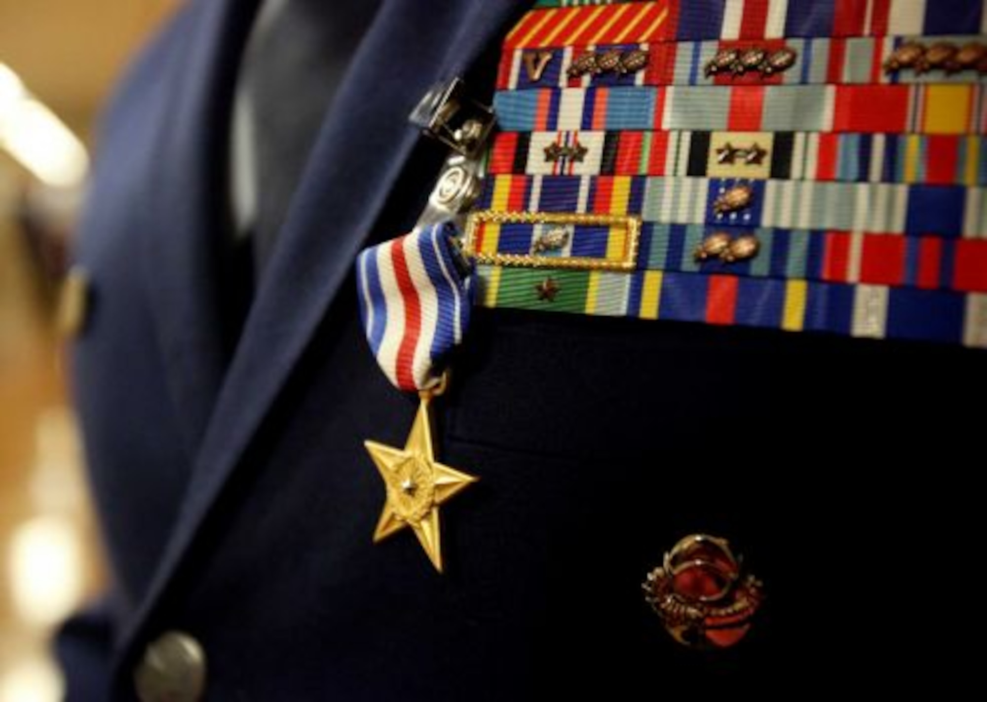 Staff Sgt. Dale C. Young from the 342nd Training Squadron and Tech Sgt. Ismael Villegas with the 24th Special Operations Wing were awarded Silver Stars during a ceremony at Joint Base San Antonio-Lackland on Monday July 22, 2013. Air Force Special Operations Command Lt. General Eric Fiel presented the commendations. (Photo By Helen L. Montoya/San Antonio Express-News)