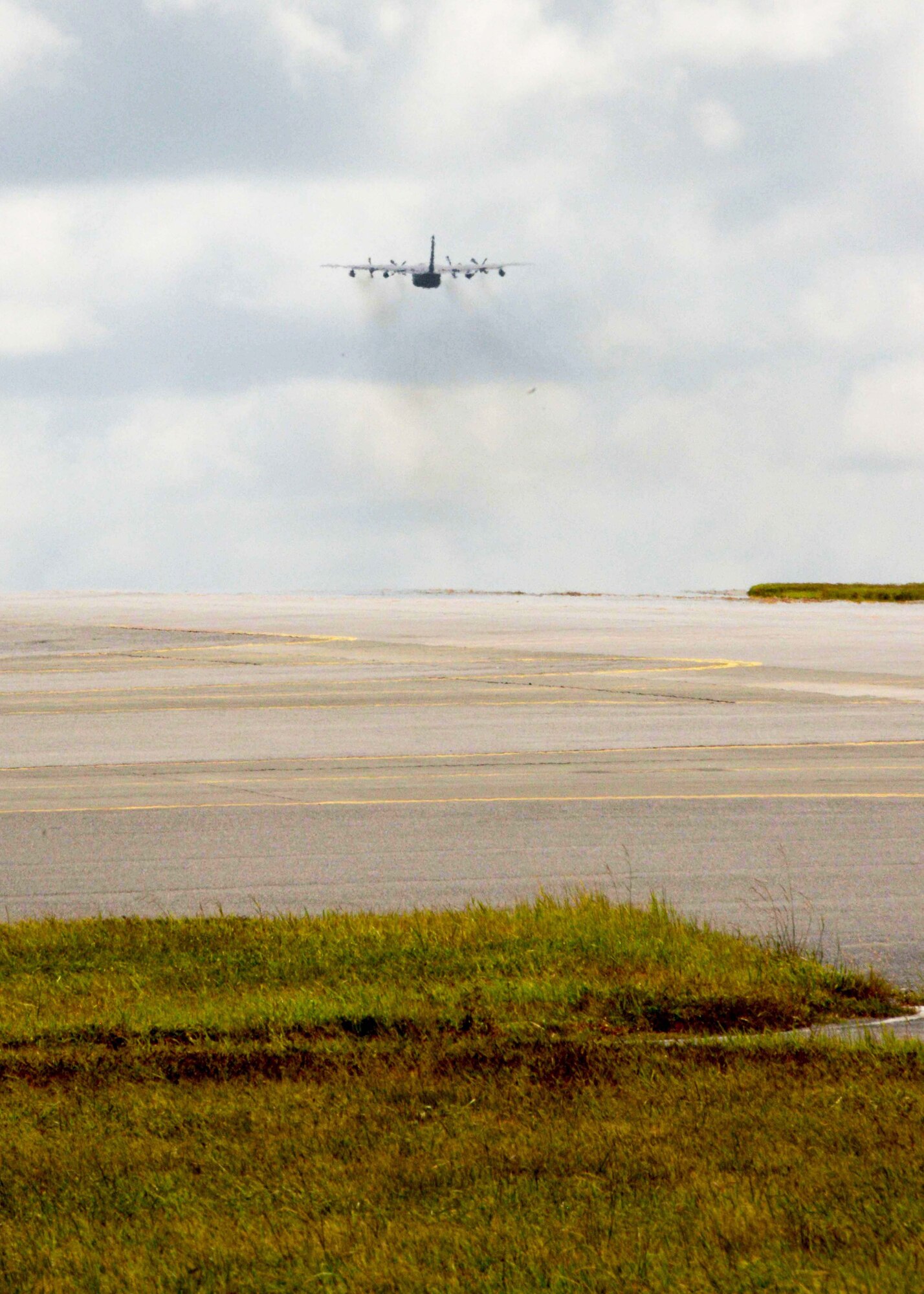 MC-130P Combat Shadow 69-5825 departs July 17, 2013, from Kadena Air Base, Japan, to Davis-Monthan Air Force Base, Ariz.  The aircraft will retire after 44 years of active service and more than 18,000 flying hours.  (U.S. Air Force photo by Tech. Sgt. Kristine Dreyer/Released)