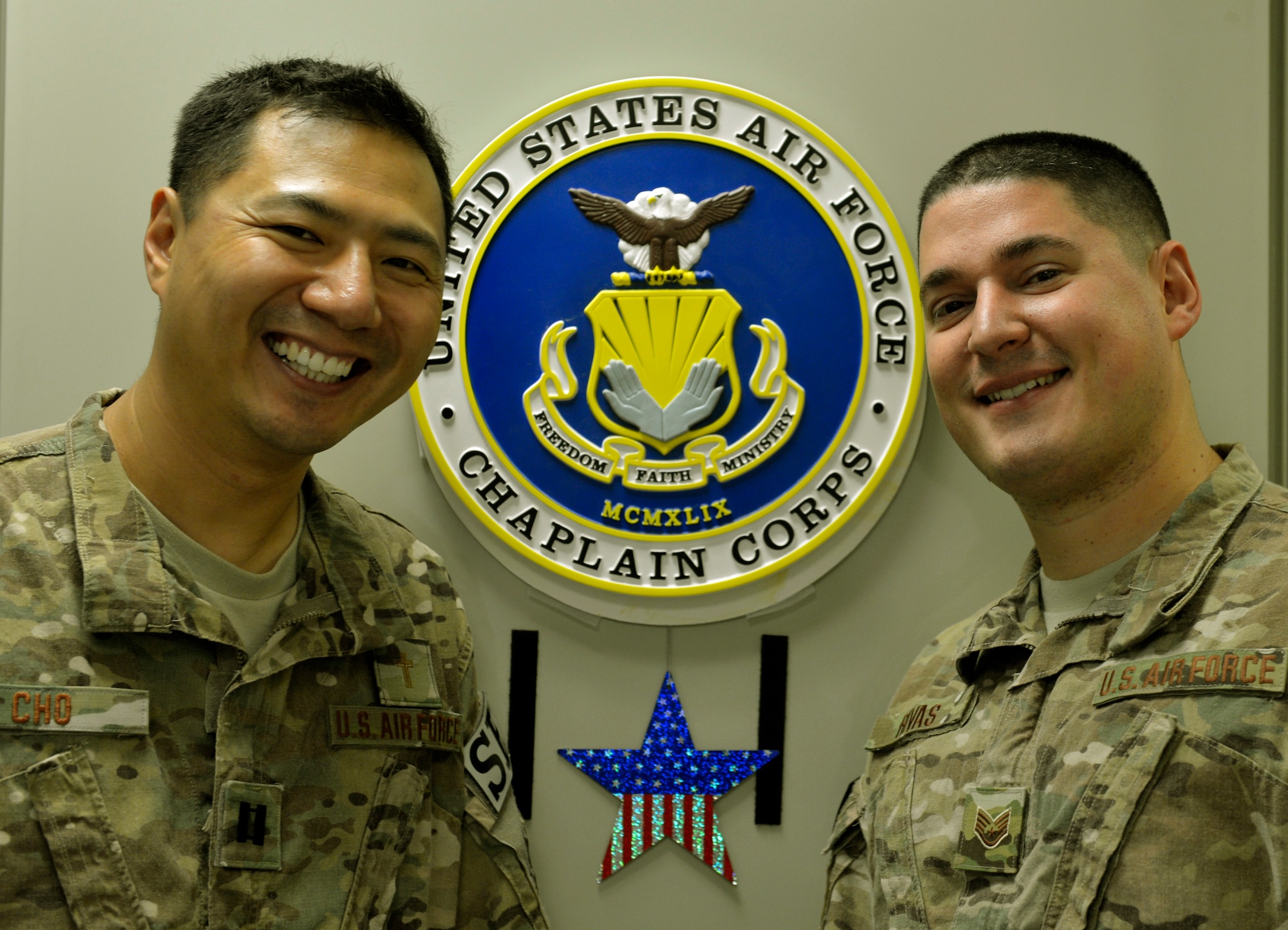 Chaplain (Capt.) Myung Cho and his assistant Staff Sgt. Frank Rivas, offer a devotion and worship services to airmen assigned to the 455th Expeditionary Security Forces Group at Bagram Air Field, Afghanistan. They visits= the Airmen day and night on shift and off, to raise their morale and offer a variety of worship services. ( U.S. Air Force photo/ Staff Sgt. Stephenie Wade)