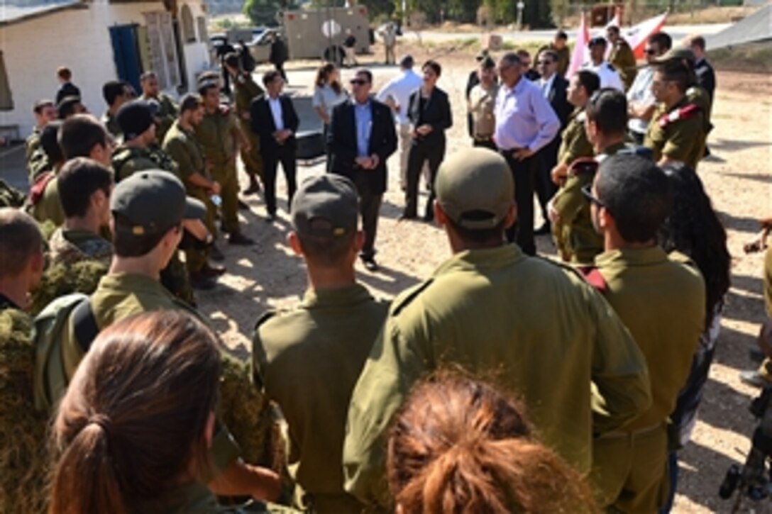 Deputy Secretary of Defense Ashton B. Carter, center, talks to a group of Israel Defense Force soldiers at Mitkan Adam Army Base in Israel on July 21, 2013.  Carter is on his first official trip to Israel where he will discuss the situations in Syria and Iran and reaffirm the U.S.-Israeli defense relationship.  