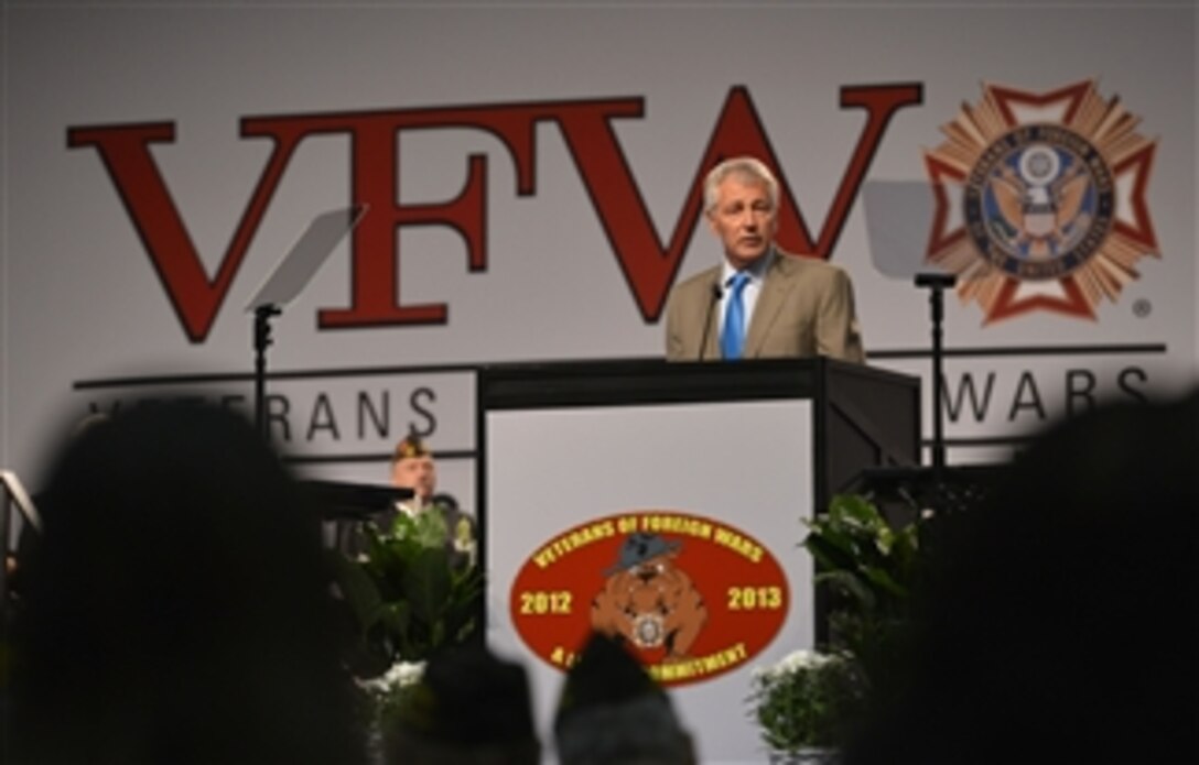 Secretary of Defense Chuck Hagel addresses the attendees of the Veterans of Foreign War National Convention held at the Louisville International Convention Center in Louisville, Ky., on July 22, 2013.  Hagel called on the nation’s veterans to become partners in helping the Defense Department work through “historic transition and change.”  