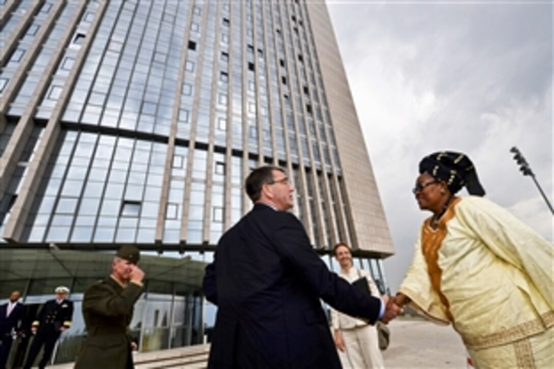 U.S. Deputy Defense Secretary Ash Carter meets with Yetunde Teriba, the head of the Gender Coordination and Outreach Division at the African Union Commission, outside of the African Union headquarters in Addis Ababa, Ethiopia, July 24, 2013.