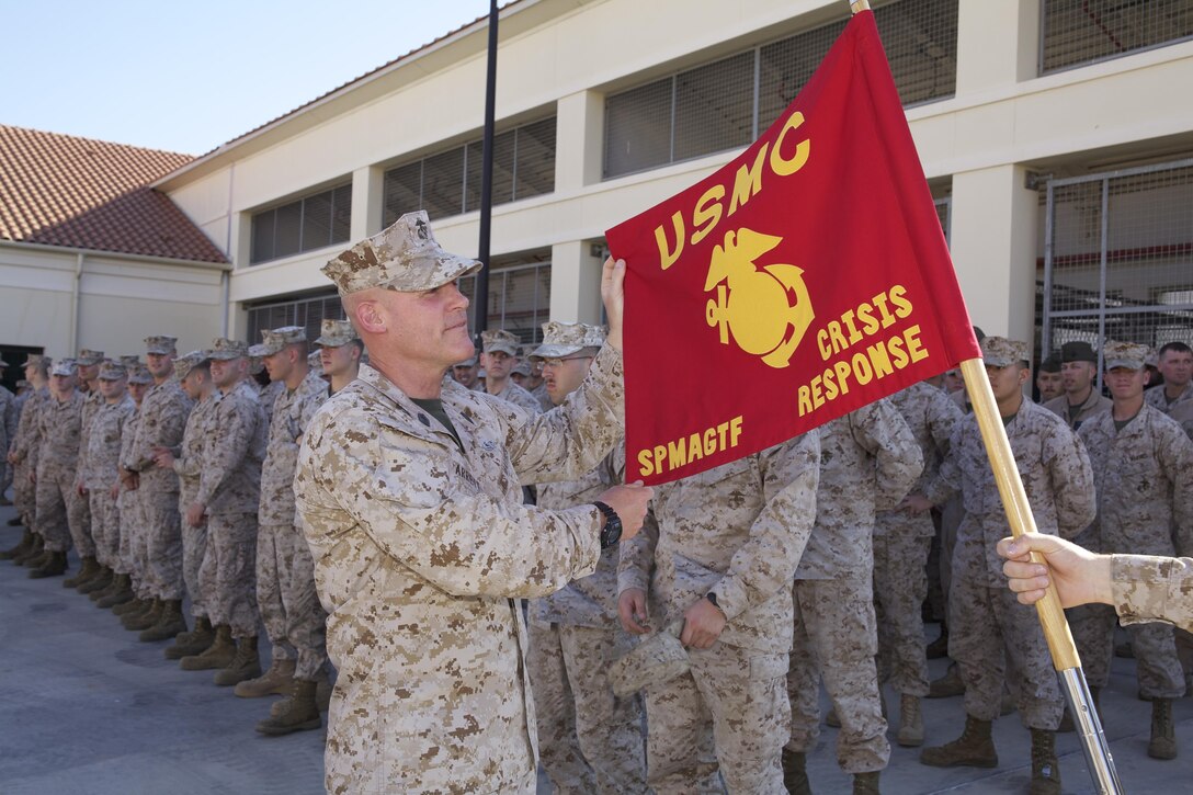 Sgt. Maj. Micheal P. Barrett, the 17th Sergeant Major of the Marine Corps, addresses Marines and Sailors with the Special-Purpose Marine Air-Ground Task Force Crisis Response at the Naval Air Station in Sigonella, Italy on June 16, 2013.(U.S. Marine Corps photo by Sgt. Mallory S. VanderSchans)