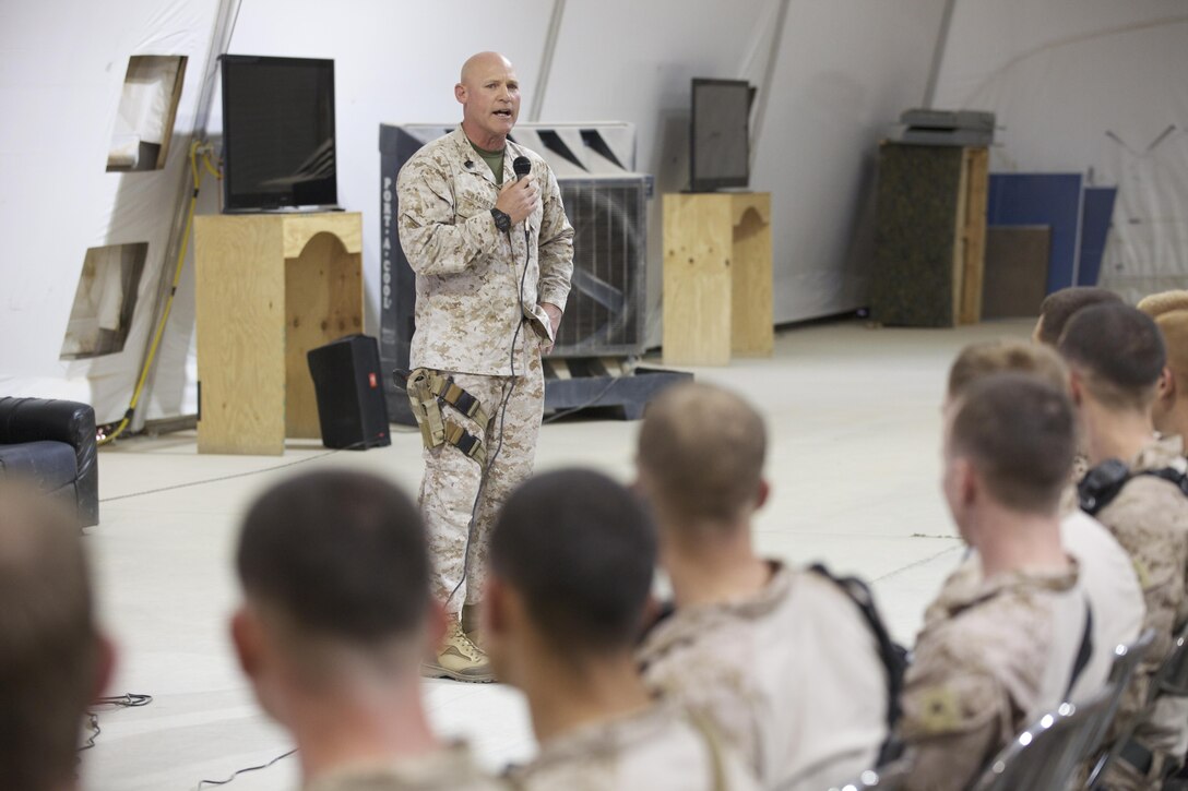 Sgt. Maj. Micheal P. Barrett, the 17th Sergeant Major of the Marine Corps, visits Marines and Sailors during a battlefield circulation at Camp Dwyer, Helmand Province, Afghanistan on June 19, 2013. (U.S. Marine Corps photo by Sgt. Mallory S. VanderSchans)