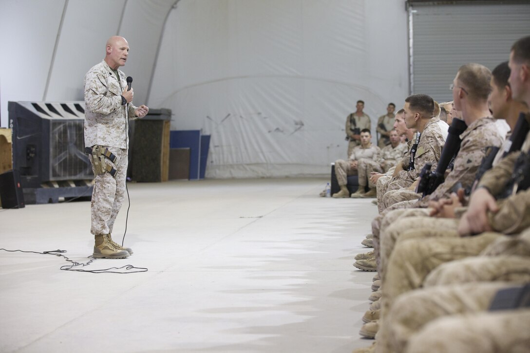 Sgt. Maj. Micheal P. Barrett, the 17th Sergeant Major of the Marine Corps, visits Marines and Sailors during a battlefield circulation at Camp Dwyer, Helmand Province, Afghanistan on June 19, 2013. (U.S. Marine Corps photo by Sgt. Mallory S. VanderSchans)
