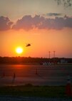 A helicopter lands on Simmons Army Air Field, Aug. 24. FEMA workers arrived at Simmons Army Air Field, Aug. 23, in preparation for Hurricane Irene. The first group of FEMA staff set up the Incident Staging Base in the corner of the air field prepared to welcome over 40 FEMA truck throughout the night and more arriving Aug. 24. FEMA will work hand in hand with the Army Corps of Engineers to ensure Fort Bragg's safety as the hurricane approaches the coastline.