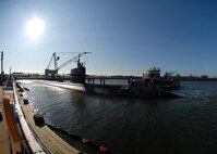 A Los Angeles-class attack submarine departs Naval Station Norfolk ahead of Hurricane Irene. Vice Adm. Daniel Holloway, commander of U.S. 2nd Fleet, ordered all ships in the Hampton Roads area to set Sortie Condition Alpha. Ships in the area are departing early Thursday morning, Aug. 25. Irene's current track indicates it will pass off the North Carolina and Virginia coasts late Saturday as a Category 3 hurricane. 