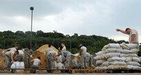 U.S. Air Force Airmen from Public Works fill sand bags at Joint Base Anacostia-Bolling, D.C., Aug 25 in preperation for Hurricane Irene. Hurricane Irene is expected to hit the U.S. east coast over the weekend and may bring heavy winds and flooding. 