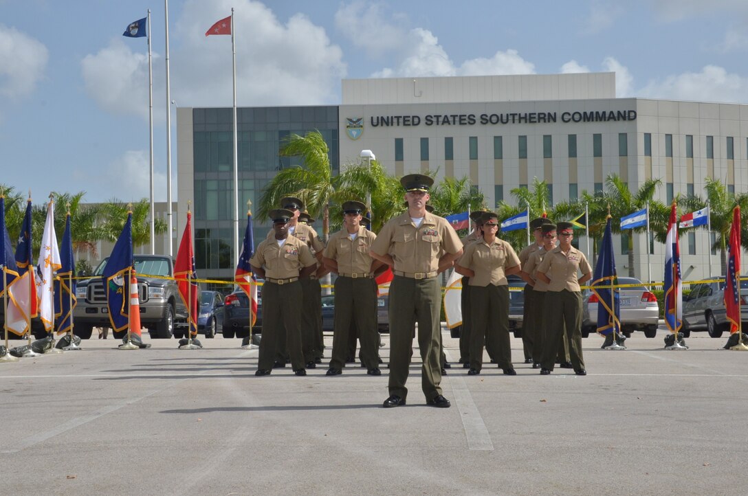 Marines from U.S. Marine Corps Forces South stand at parade rest during a change of command ceremony here, June 21.  Brig. Gen. W. Blake Crowe relinquished command of U.S. Marine Corps Forces South to Brig. Gen. David Coffman during a change of command ceremony at the U.S. Southern Command headquarters.  (U.S. Army photo by Juan Chiari/Released)