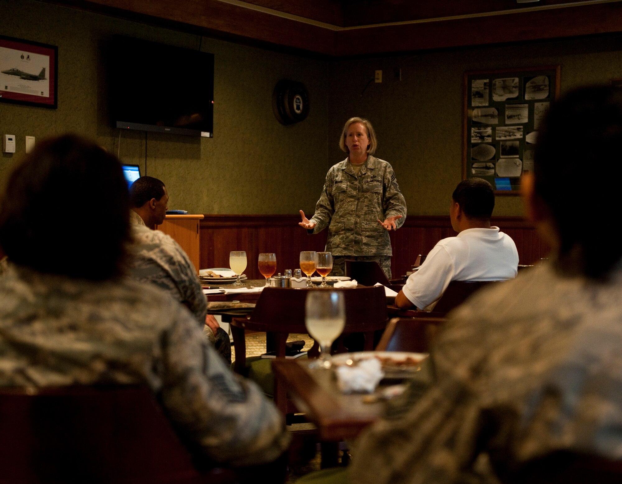 Chief Master Sgt. Rhonda Miller, 8th Fighter Wing command chief, speaks with senior noncommissioned officers about mentoring and mentorship during a lunch and learn at Kunsan Air Base, Republic of Korea, July 24, 2013. The lunch is a way for SNCOs to share knowledge and learn from eachother without disrupting their schedules. Miller plans on hosting a lunch and learn session each month for SNCOs to discuss topics they have seen or heard aorund the base. (U.S. Air Force photo by Senior Airman Clayton Lenhardt/Released)