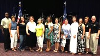 Gen. Edward A. Rice Jr., commander, Air Education and Training Command and his wife Teresa; Misty Lopez, 502 ABW/902 SFS;  Shannel Barnhill, 688 IOW/90 IOS; Donna Gardner, Navy Medicine Training Support Command, and her friend; Brooke Poole, 37 TRW/321 TRS; Carmelita Rocourt, HQs Bn., Army North; Laura Cada, AF Life Cycle Management Center Det 6; Alice Tapia, AETC command chief’s spouse; Leslie LaBrutta and Brig. Gen. Robert LaBrutta, commander, JBSA and 502nd Air Base Wing pose for a photo at the Joint Base San Antonio Spouse Appreciation Social July 20 at the Roadrunner Community Center at JBSA-Fort Sam Houston. Unit first sergeants and chief petty officers from the Army, Navy, and Air Force nominated those spouses who have distinguished themselves for their unselfish contributions to service members and families’ quality of life. The event was attended by senior leaders from across the joint base. Music was provided by the Band of the West and attendees had the opportunity to learn about programs tailored to benefit military families.

