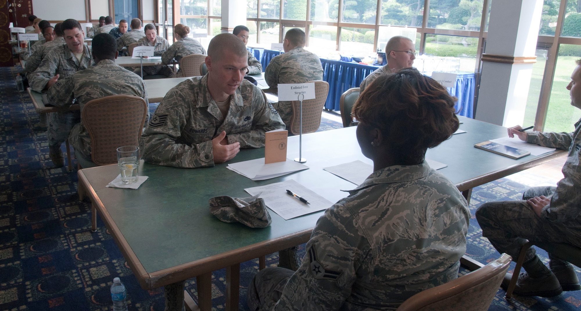 YOKOTA AIR BASE, Japan – Non-commissioned officers and Airmen participate in a speed mentoring program at Yokota Air Base, Japan, July 22, 2013.  Topics discussed included the enlisted force structure, stress management and many others.  (U.S. Air Force photo by Airman 1st Class Soo C. Kim)