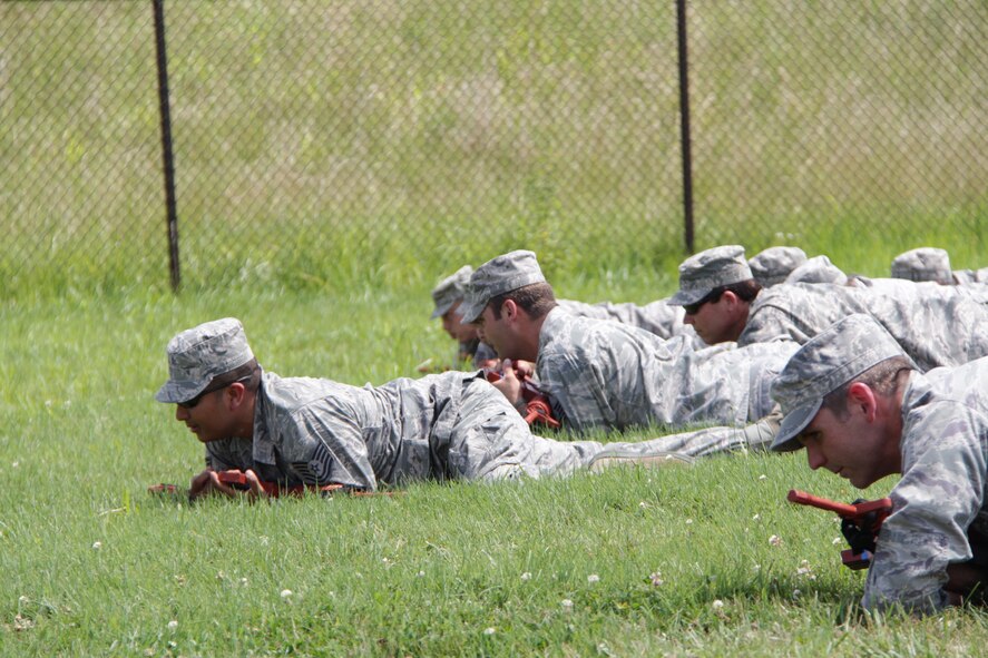 Members of 932nd Airlift Wing Civil Engineers conduct weapons training during July UTA.  This training is done so that they can protect their equipment while forward deployed. (U.S. Air Force photo/Staff Sgt. Meiko Schill)