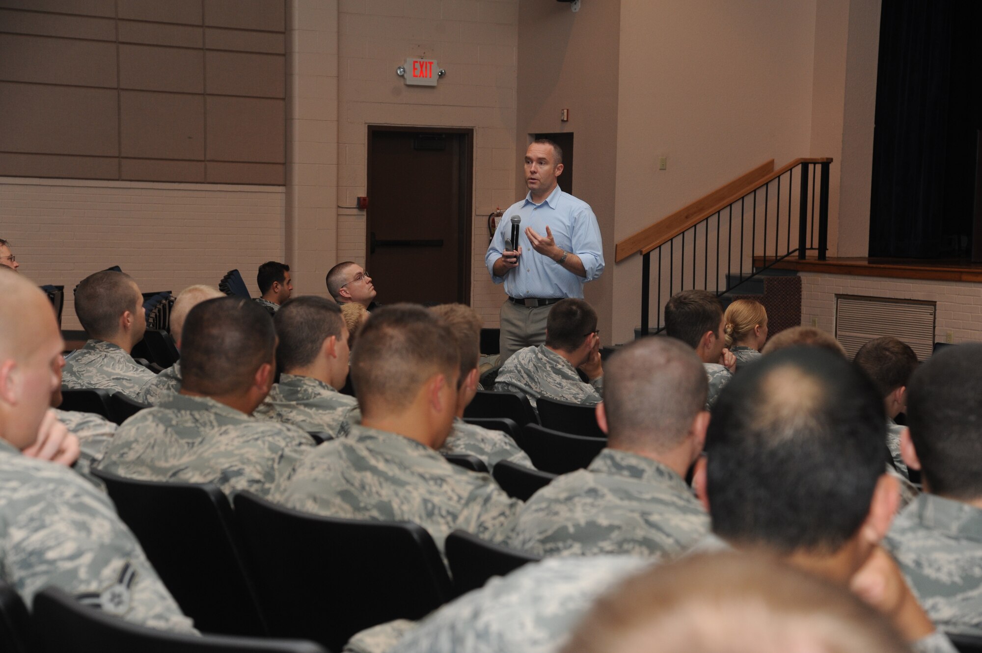 Dr. Craig Bryan, clinical psychologist in cognitive behavioral psychology, discusses tips on resiliency with McConnell Airmen July 23, 2013, at McConnell Air Force Base, Kan. Approximately 700 individuals came to receive resiliency advice from Bryan. (U.S. Air Force photo/Airman 1st Class John Linzmeier)