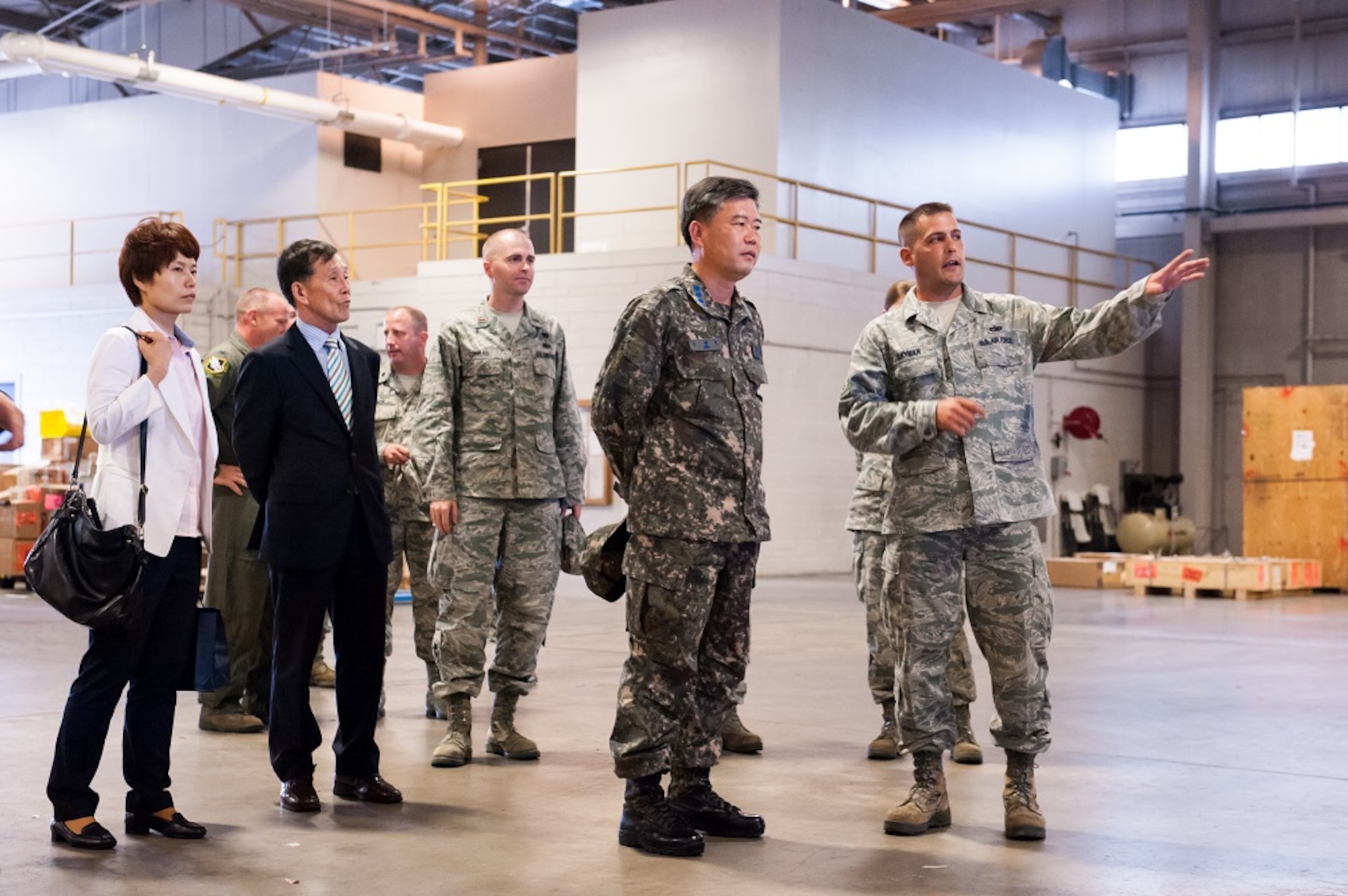 Col. Woo MaengHo, of the Republic of Korea, visits the 305th Aerial Port Squadron and receives a briefing on receiving and transporting procedures July 12, 2013, at Joint Base McGuire-Dix-Lakehurst, N.J. The delegation from the ROK Air Force toured various units at JB MDL. (U.S. Air Force photo by Russ Meseroll/Released) 