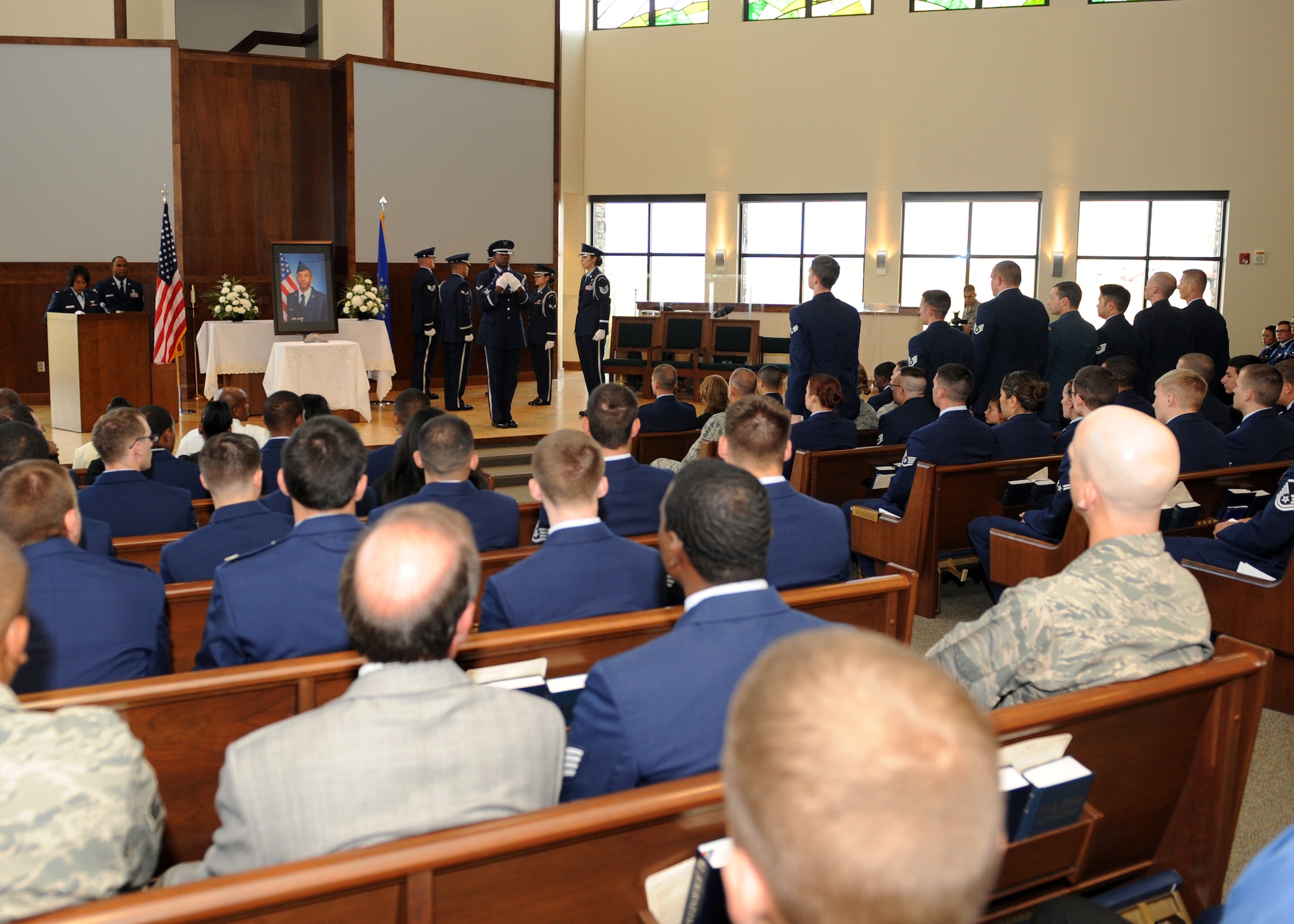The 2nd Space Warning Squadron conducts the final role call July 24, 2013, at the chapel on Buckley Air Force Base, Colo. The final role call is done by calling out squadron members’ names with Airman 1st Class Shaquille Hargrove’s name being called last, and then it is followed by silence.  His name is called a second and third time with no answer, reminding all in attendance of who was lost. (U.S. Air Force photo by Senior Airman Marcy Glass/Released)