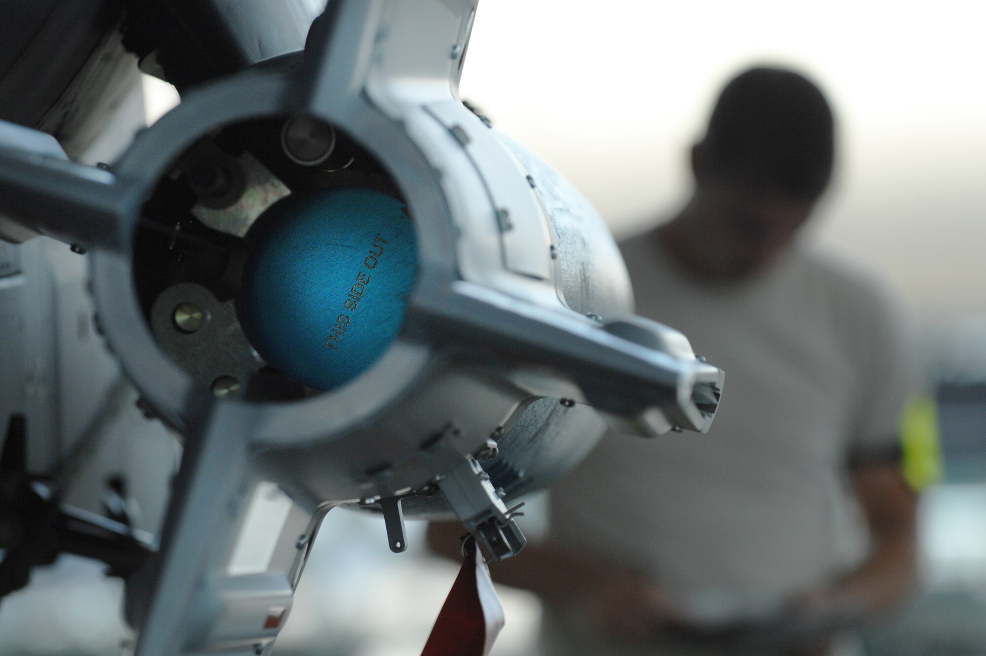 After installing a GBU-12 bomb onto an F-15E Strike Eagle, an Airman looks over his loading checklist during a load crew of the quarter competition at Seymour Johnson Air Force Base, N.C., July 19, 2013.  All crews are required to follow checklists to ensure all weapons a installed safely and correctly.  (U.S. Air Force photo by Airman 1st Class Brittain Crolley/Released)