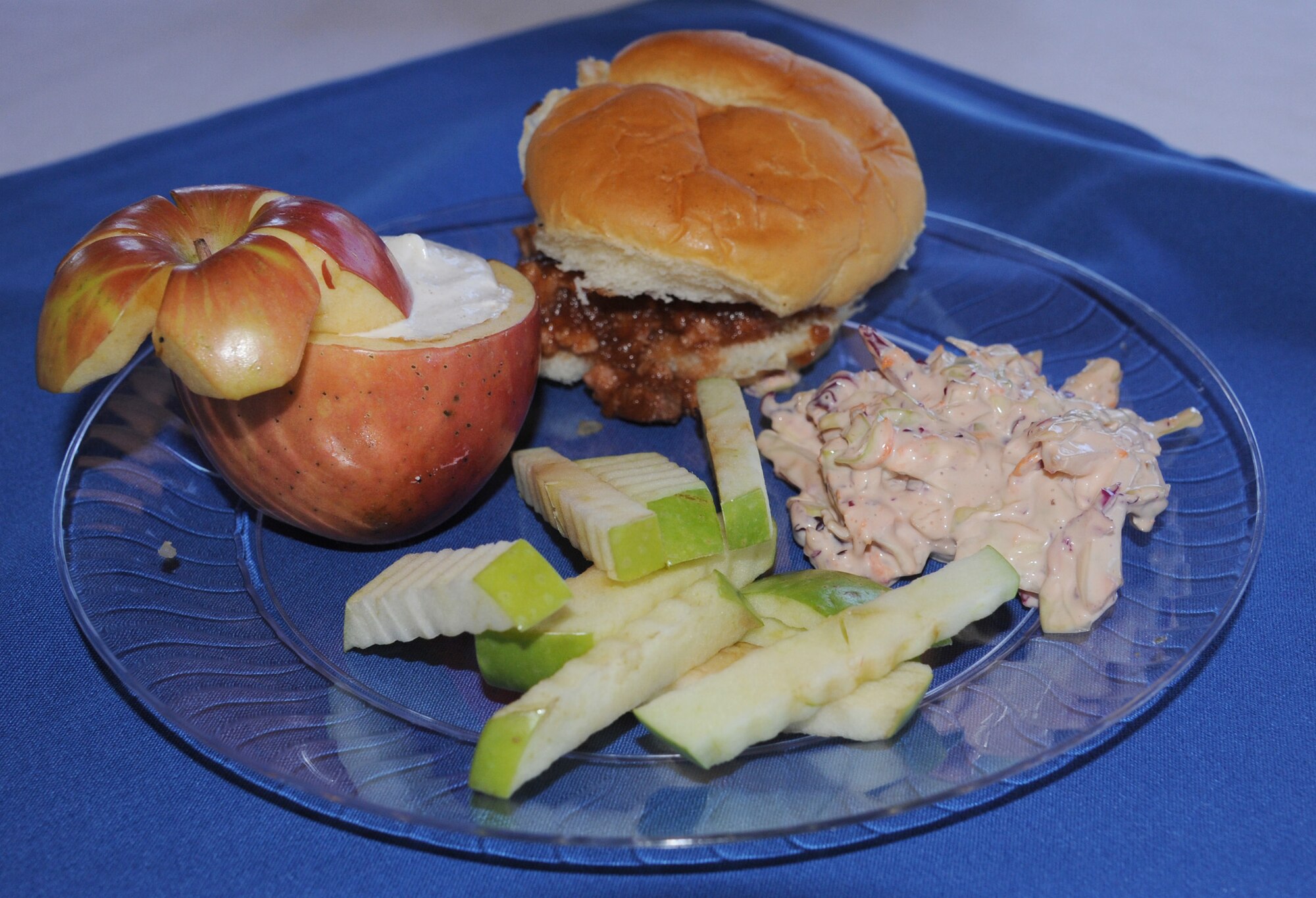 The entrée scoring the most points from the judges and earning first place was miniature pork sliders, coleslaw and apple fries during the Third Quarter Warrrior Chef Competition at Sun Plaza Park on July 19. Senior Airman Brittany Booker, 341st Force Support Squadron food service journeyman, and Airman 1st Class Casey Bennett, 341st FSS food service apprentice, created the dish. (U.S. Air Force photo/Senior Airman Katrina Heikkinen)
