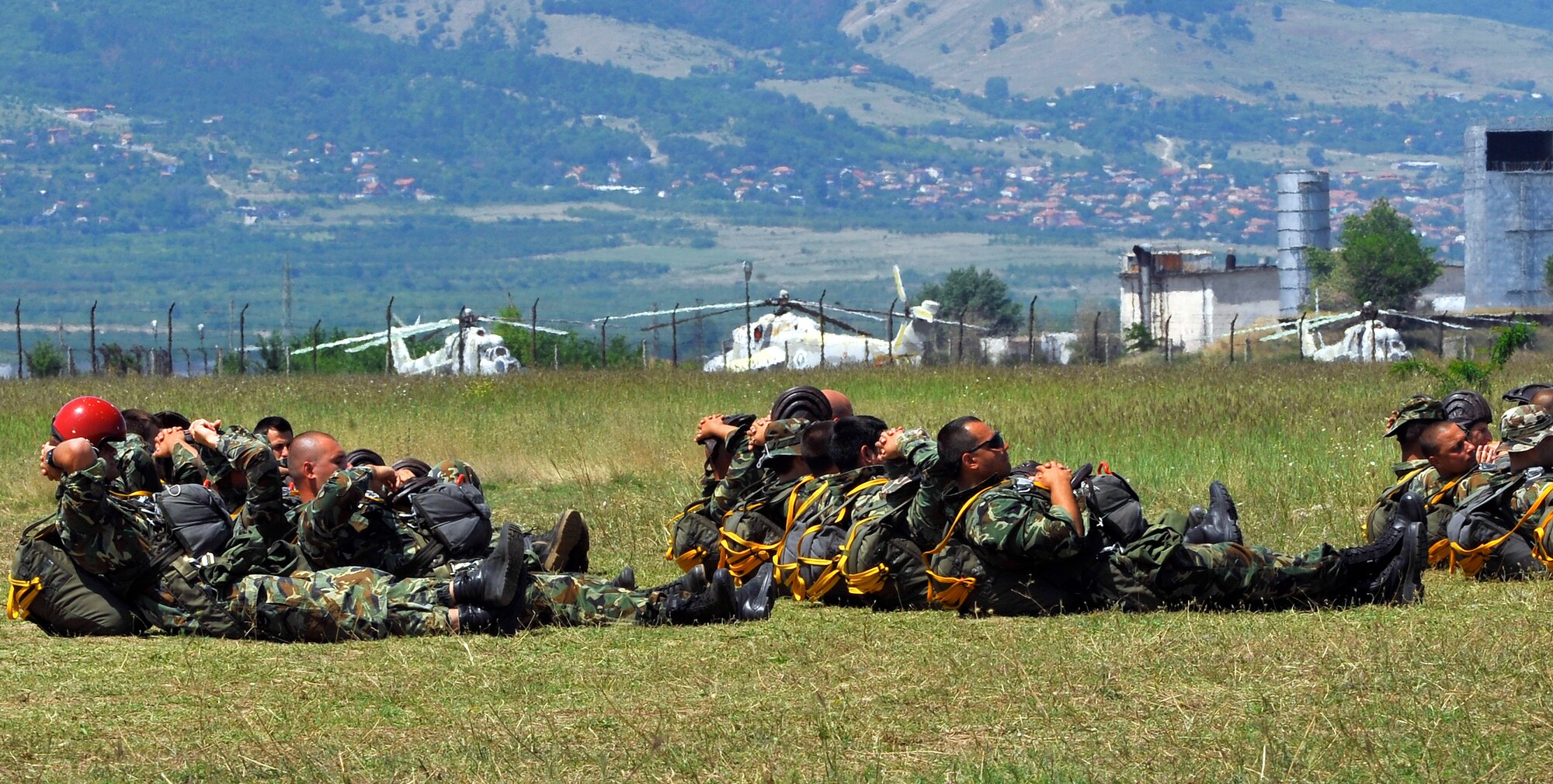 Bulgarian paratroopers wait for their opportunity to jump from a C-130J Super Hercules during a flying training deployment July 15, 2013, Plovdiv, Bulgaria. FTD Thracian Summer was a two-week training deployment for American and Bulgarian forces to work together and learn how each other perform their mission. (U.S. Air Force photo/Airman 1st Class Trevor Rhynes)