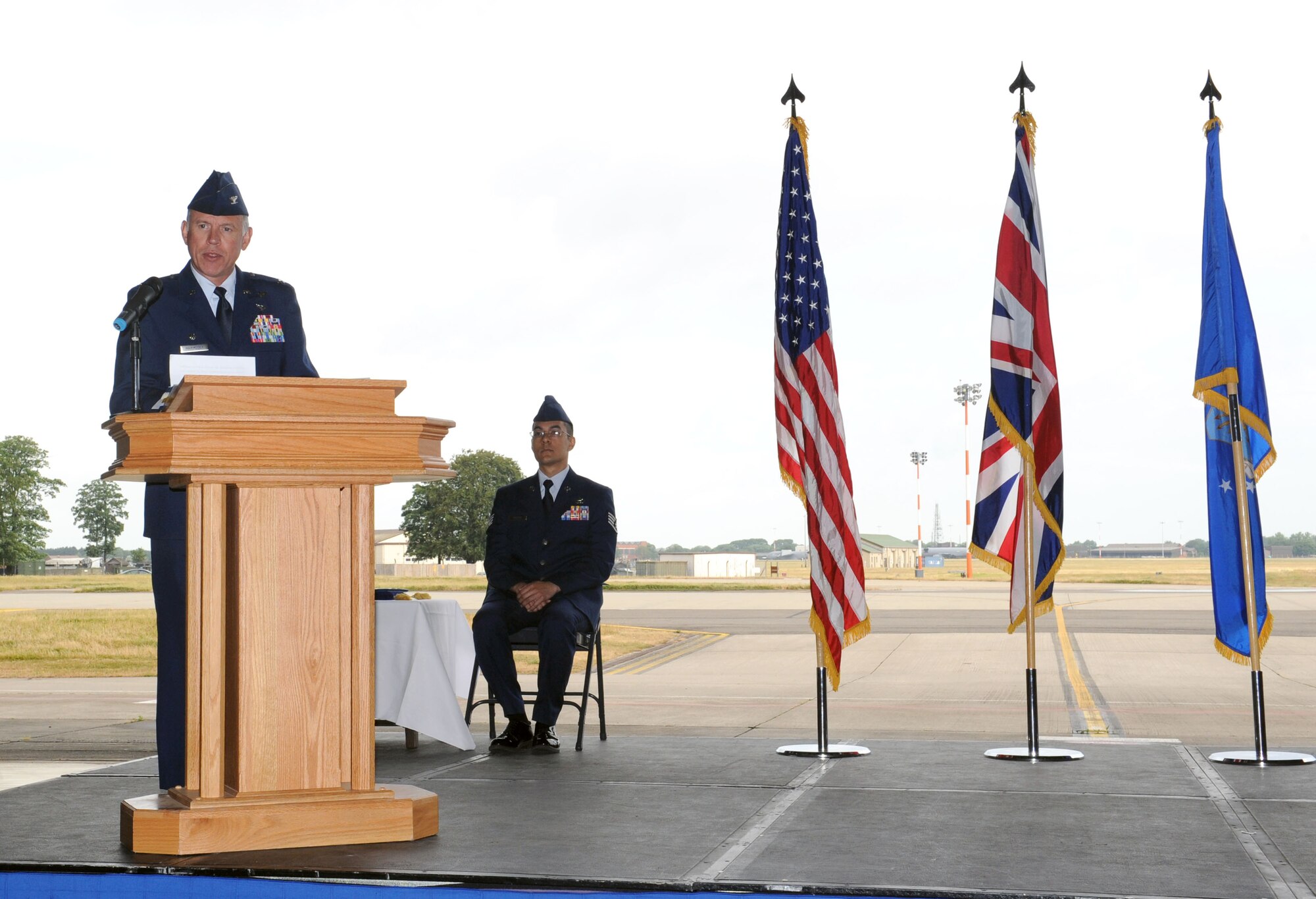 Col. Russell Mammoser, 55th Operations Group commander, Offutt Air Force Base, Neb., addresses Airmen attending the 95th Reconnaissance Squadron change of command ceremony July 25, 2013, on RAF Mildenhall, England. As the 55th OG commander, Mammoser presided over the ceremony and served as the official who transferred command of the 95th RS from Lt. Col. Eric Paulson to Lt. Col. Vincent Zaleski. (U.S. Air Force photo by Airman 1st Class Preston Webb/Released)