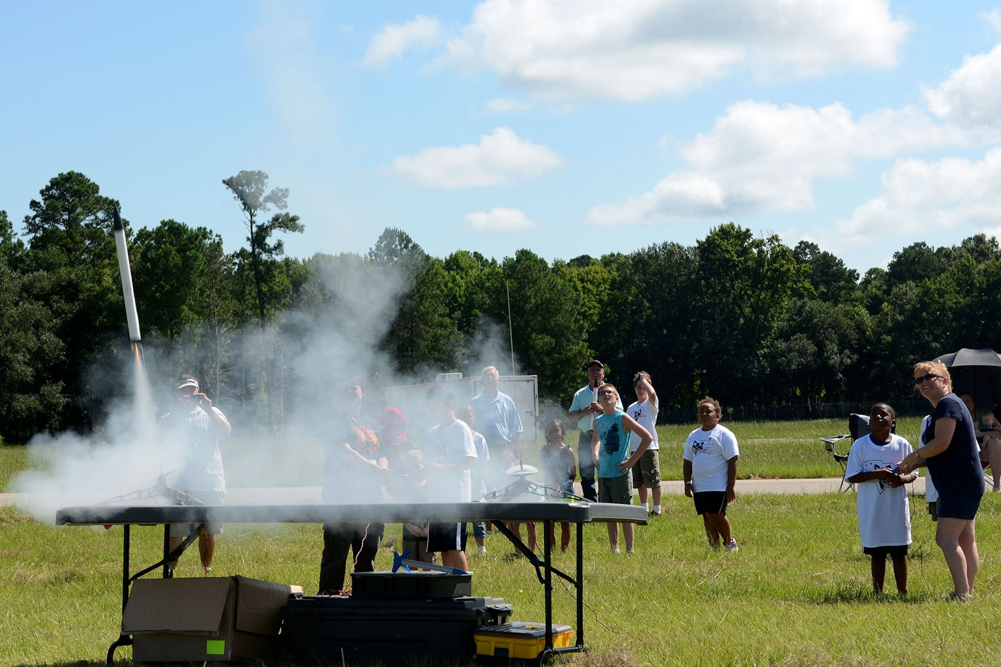 Dependents of South Carolina Army and Air National Guard Soldiers and Airmen at McEntire Joint National Guard Base attend STARBASE Swamp Fox, a DoD camp aimed at improving the knowledge and skills of youth in the areas of science, technology, engineering and mathematics, July 19, 2013. Attendees launched rockets which they studied about and built during the summer program.   (U.S. Air National Guard photo by Tech. Sgt. Caycee Watson/Released)