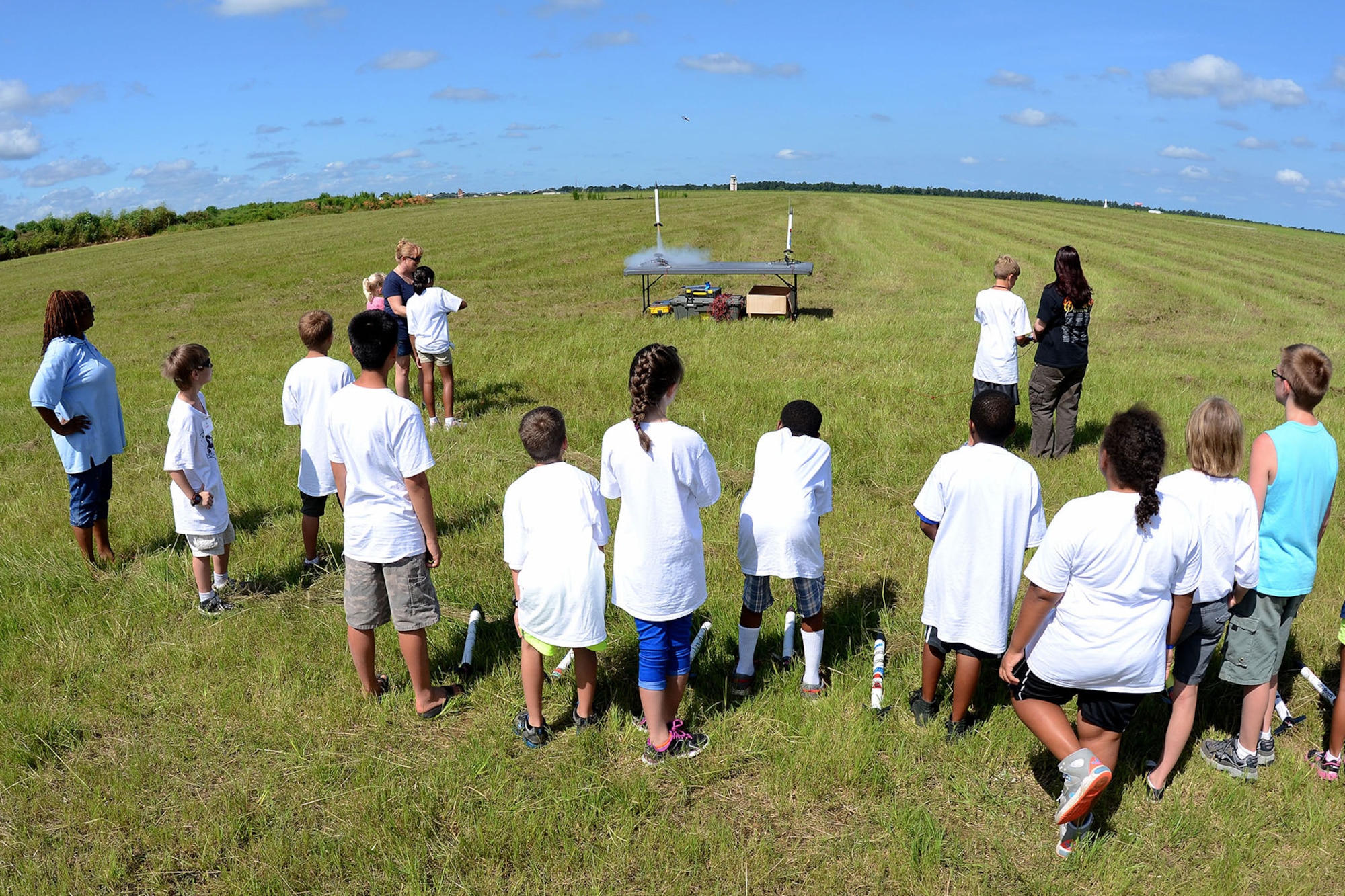 Dependents of South Carolina Army and Air National Guard Soldiers and Airmen at McEntire Joint National Guard Base attend STARBASE Swamp Fox, a DoD camp aimed at improving the knowledge and skills of youth in the areas of science, technology, engineering and mathematics, July 19, 2013. Attendees launched rockets which they studied about and built during the summer program.   (U.S. Air National Guard photo by Tech. Sgt. Caycee Watson/Released)