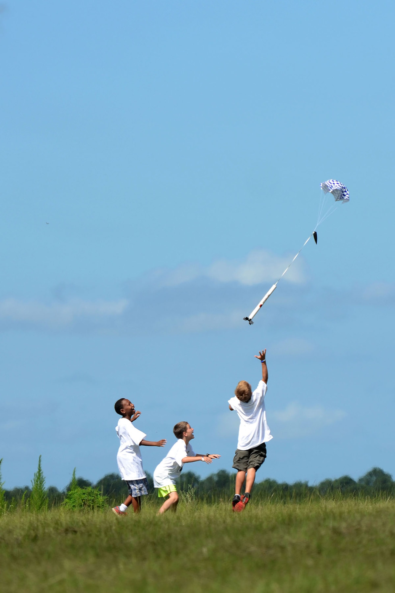 Dependents of South Carolina Army and Air National Guard Soldiers and Airmen at McEntire Joint National Guard Base attend STARBASE Swamp Fox, a DoD camp aimed at improving the knowledge and skills of youth in the areas of science, technology, engineering and mathematics, July 19, 2013. Attendees launched rockets which they studied about and built during the summer program.   (U.S. Air National Guard photo by Tech. Sgt. Caycee Watson/Released)