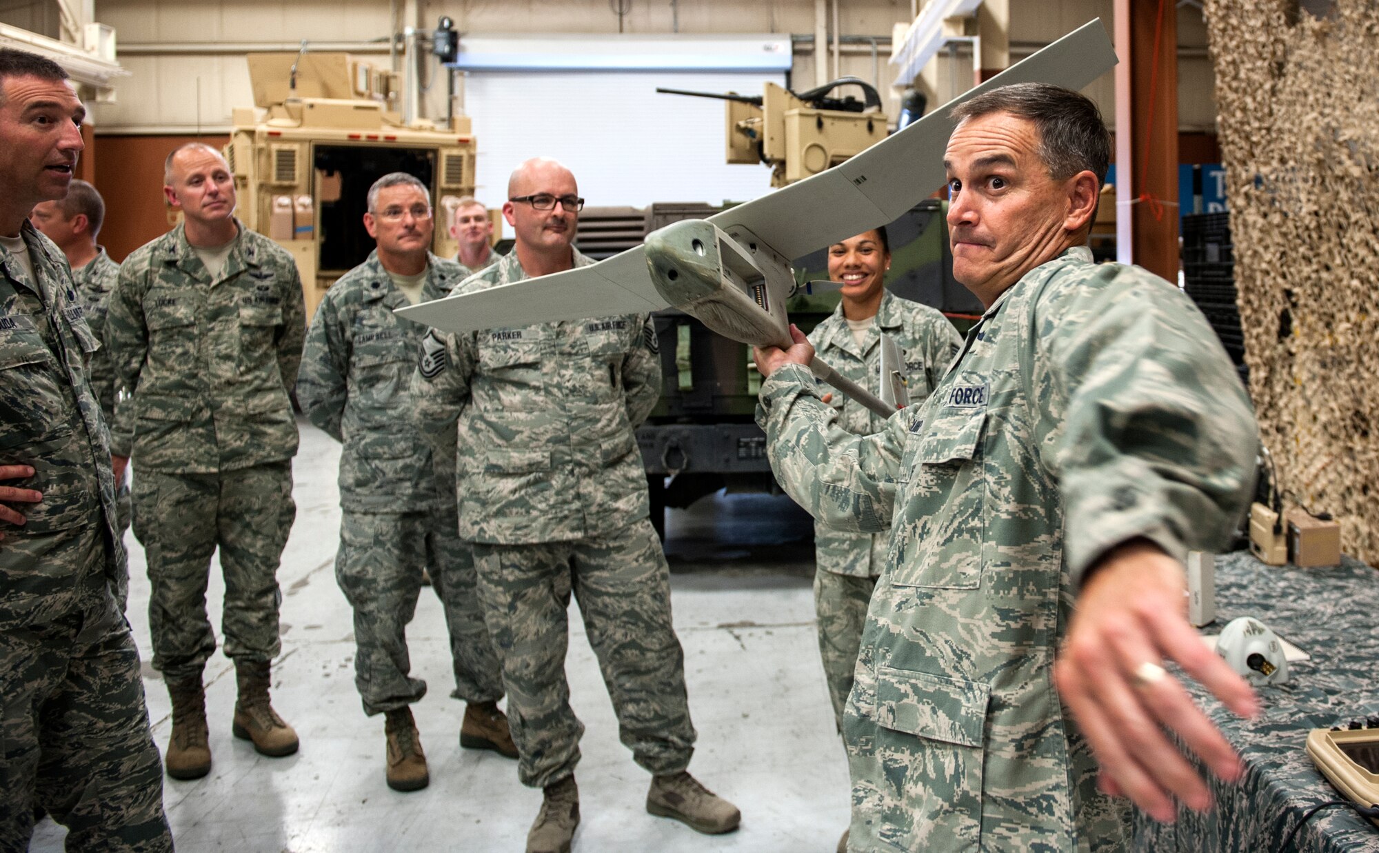 U.S. Air Force Maj. Gen. Jake Polumbo, 9th Air Force commander, pretends to throw a remotely piloted aircraft during a base visit July 19, 2013, at Moody Air Force Base, Ga. Polumbo recently took command of the 9th AF in May 2013. (U.S. Air Force photo by Senior Airman Jarrod Grammel/Released)
