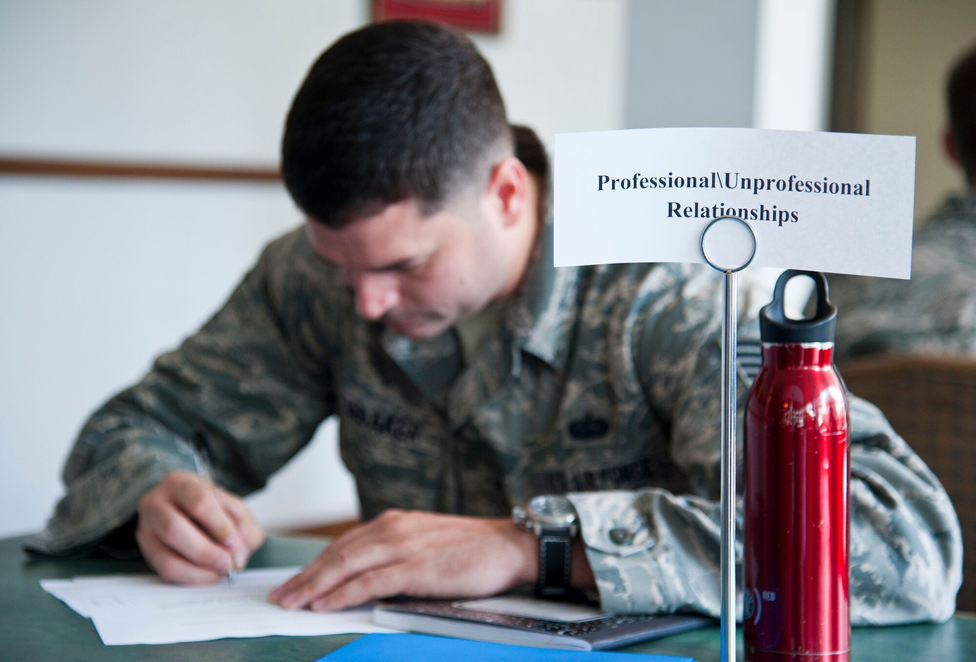 YOKOT AIR BASE, Japan – Tech. Sgt. Matthew Radaker, the non-commissioned officer in charge of Network Control Center at the 374th Communications Squadron, prepares for the mentor session at Yokota Air Base, Japan, July 22, 2013.  Non-commissioned officers from various units volunteered to give mentoring to young Airmen to strengthen their military career and future goals.  (U.S. Air Force photo by Airman 1st Class Soo C. Kim)